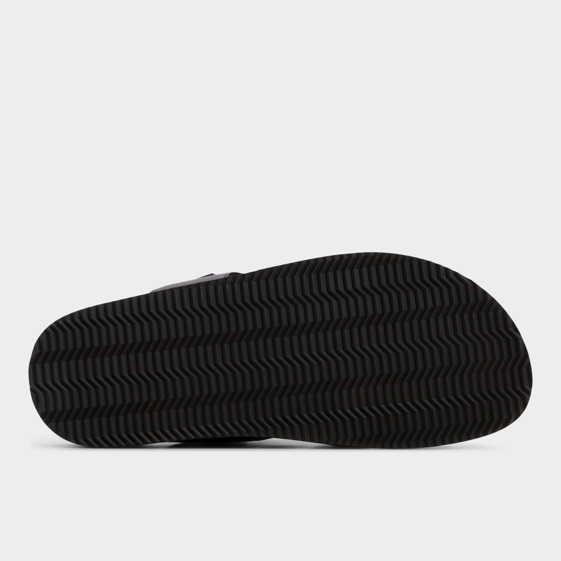 View of Dark brown Nuno Strappy flat sandal's sole