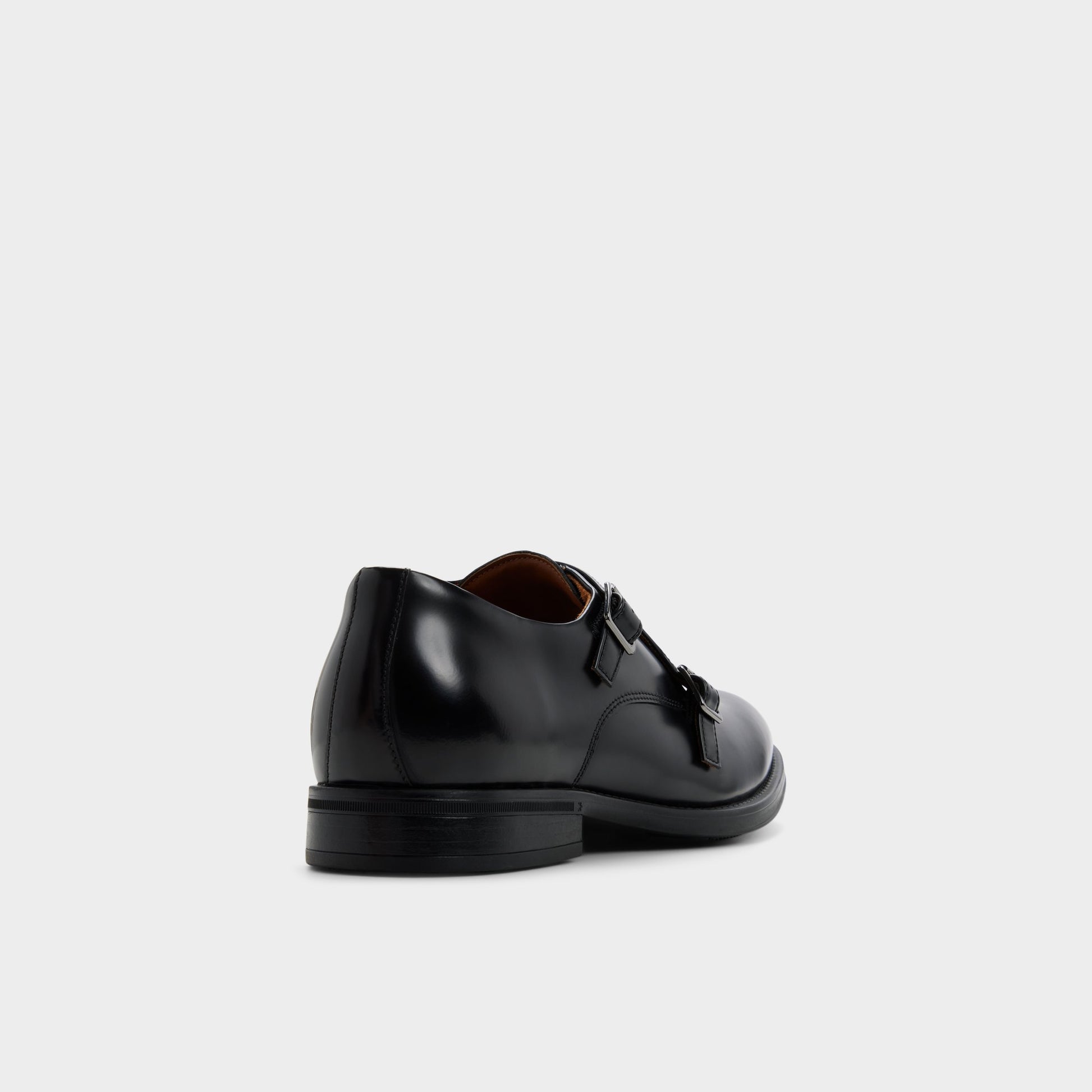 Three-quarter angle of Black Gomez Monkstrap loafer's back side