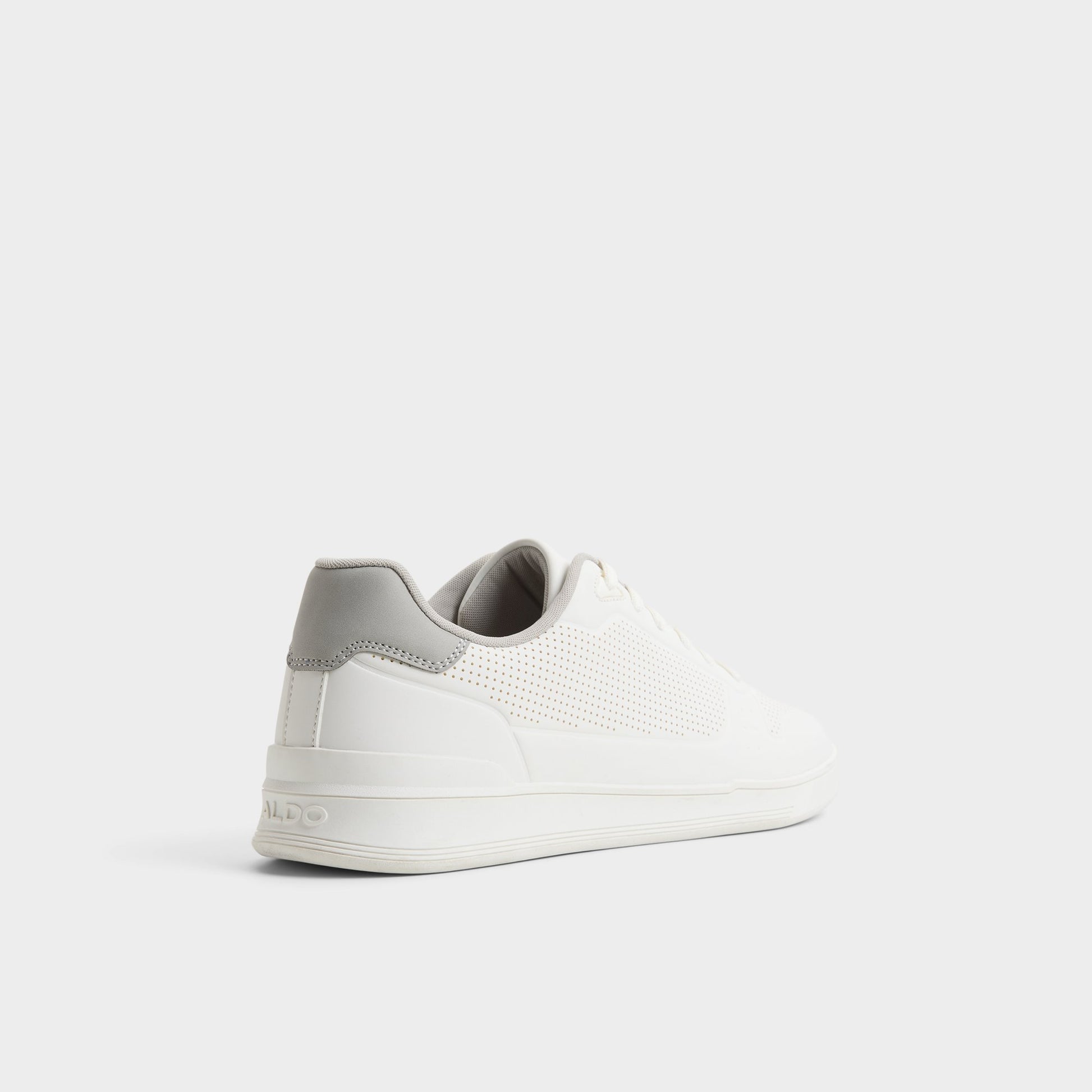Three-quarter angle of White Robie Low top sneaker's back side