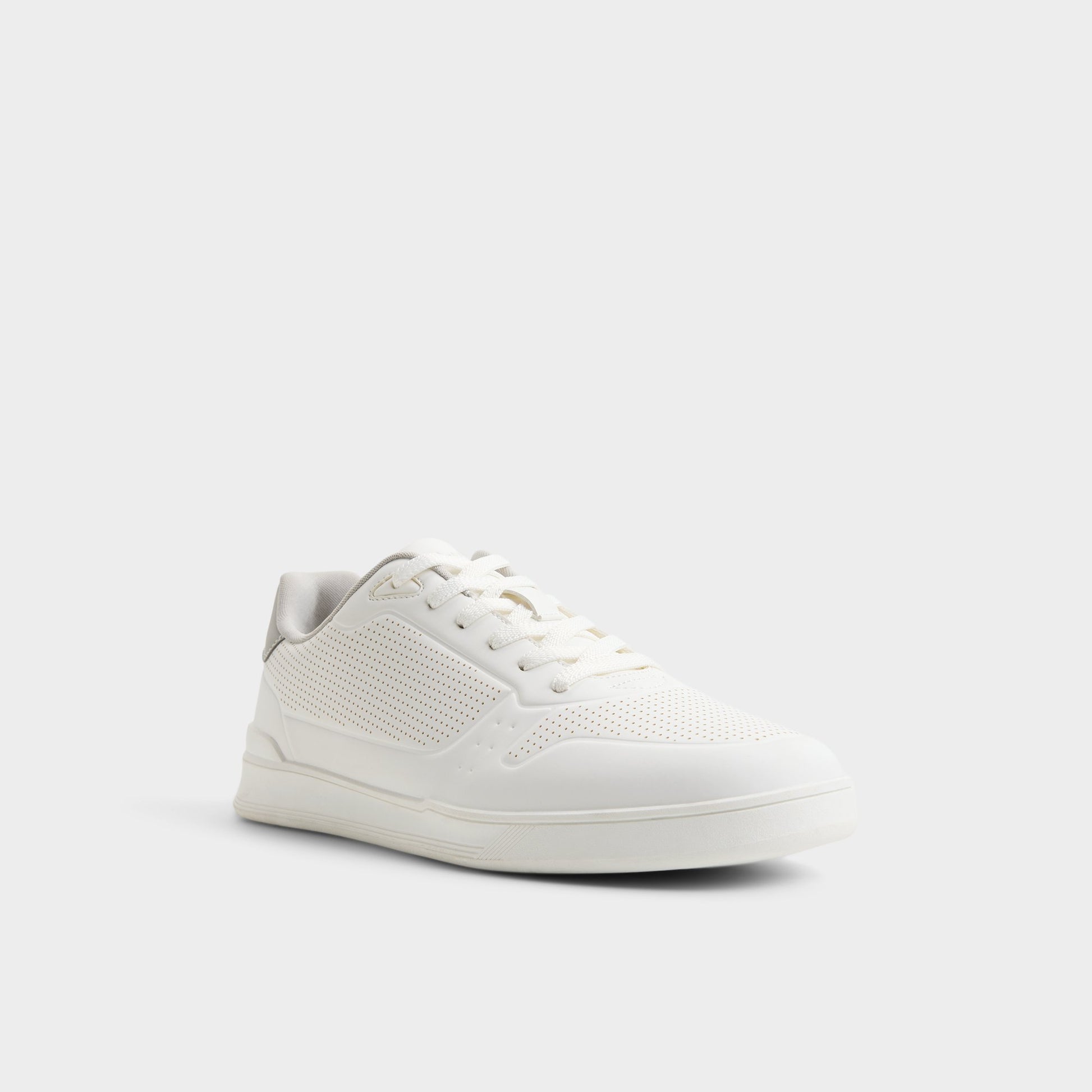 Three-quarter angle of White Robie Low top sneaker's front side