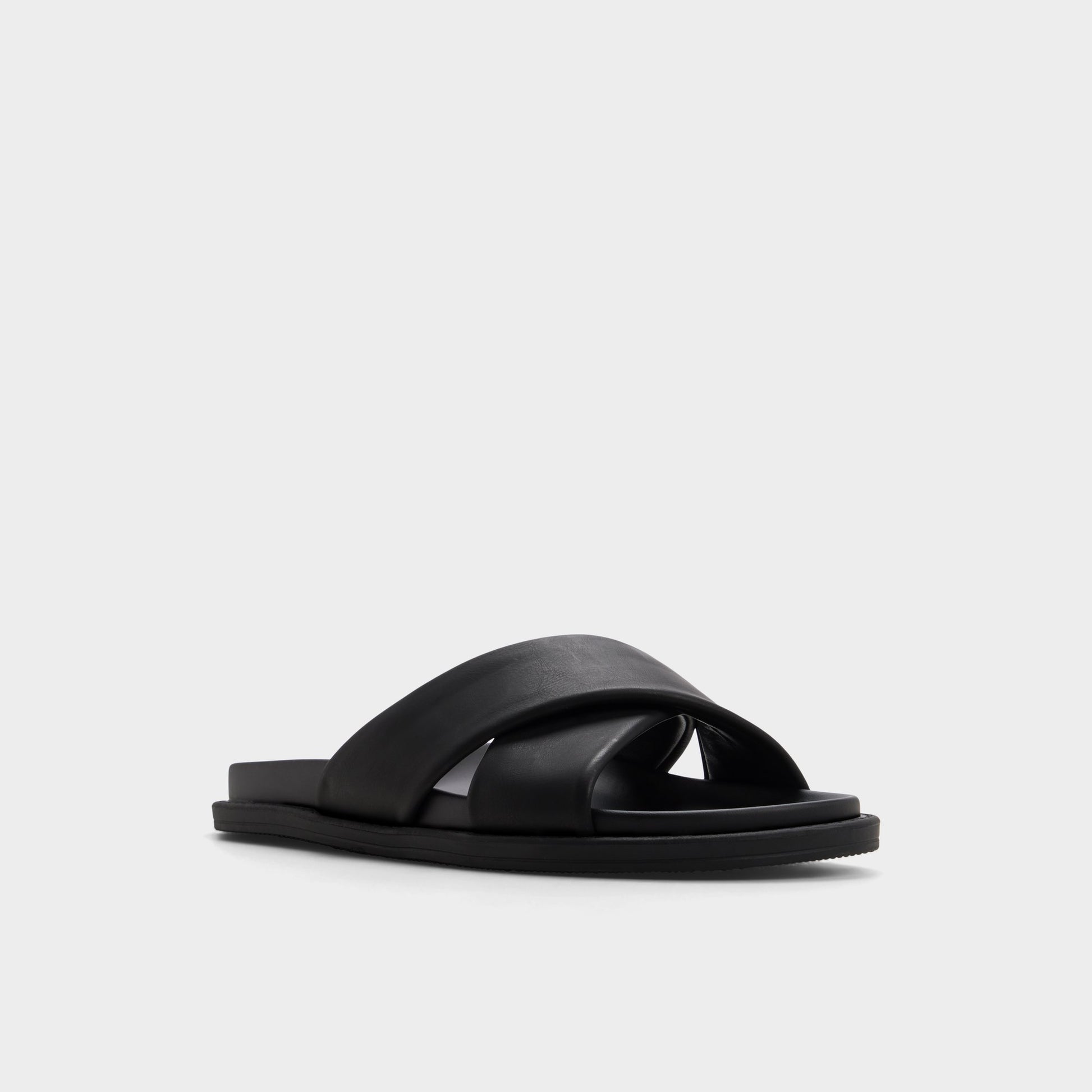 Three-quarter angle of Black Borgo Slide sandal's front side