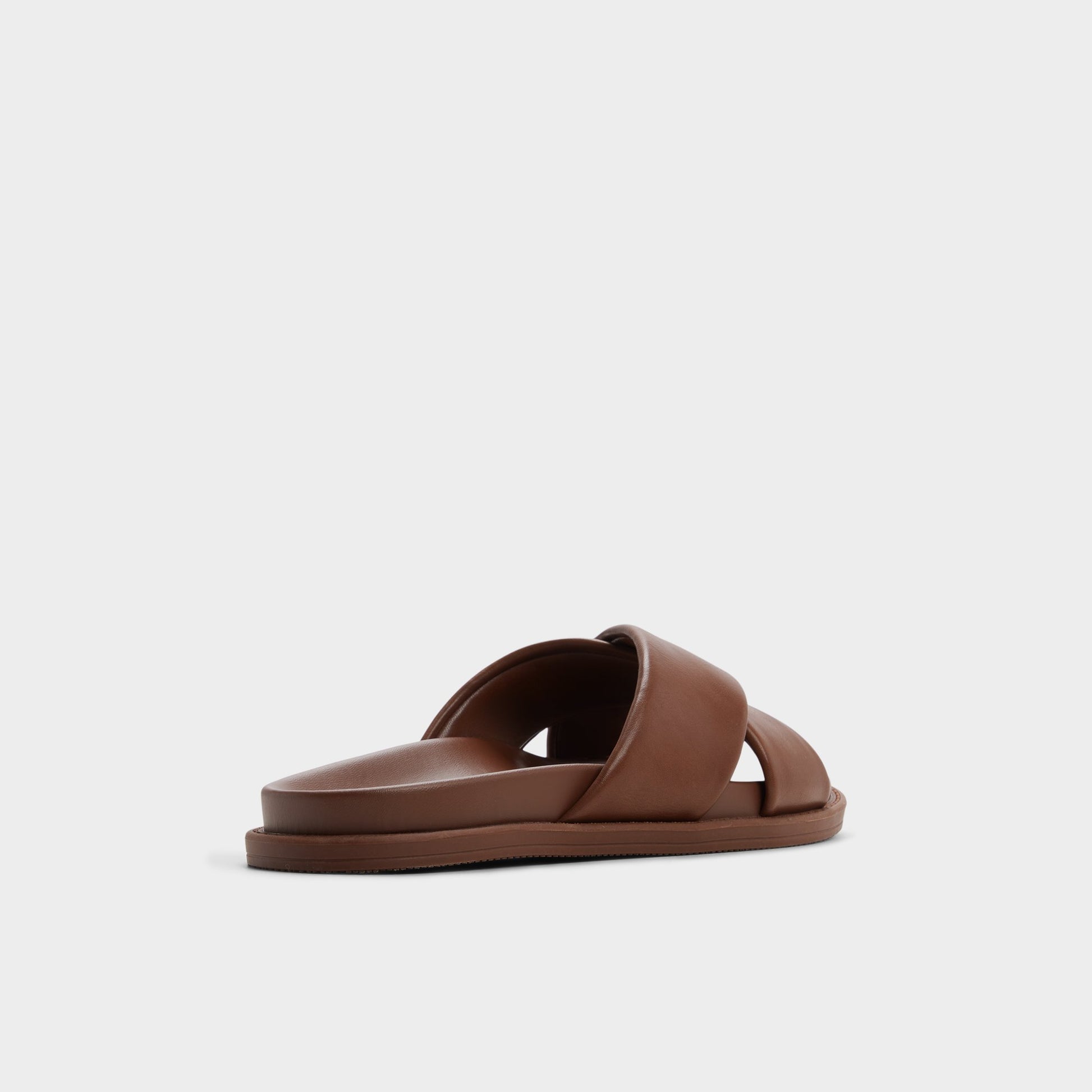 Three-quarter angle of Dark brown Borgo Slide sandal's back side