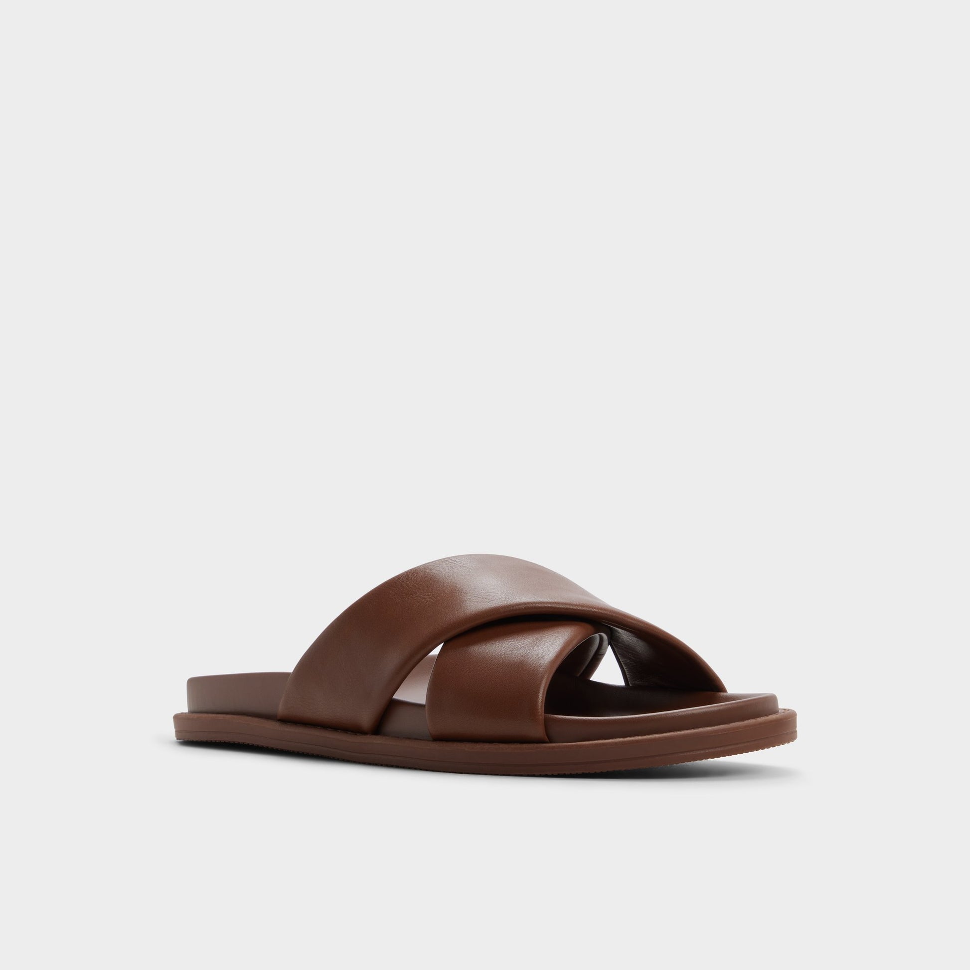Three-quarter angle of Dark brown Borgo Slide sandal's front side
