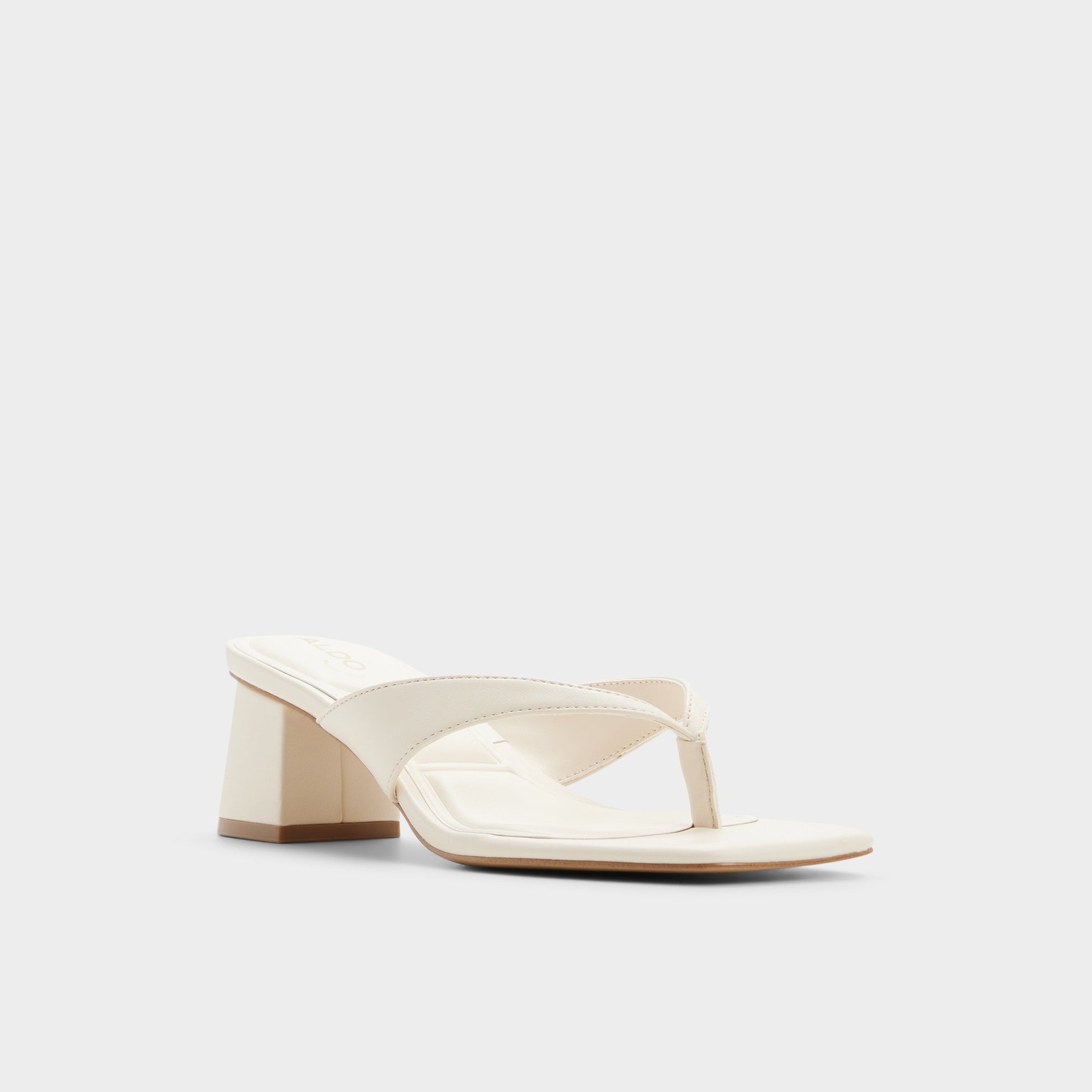 Three-quarter angle of Other white Antonina Block heeled flip flop's front side