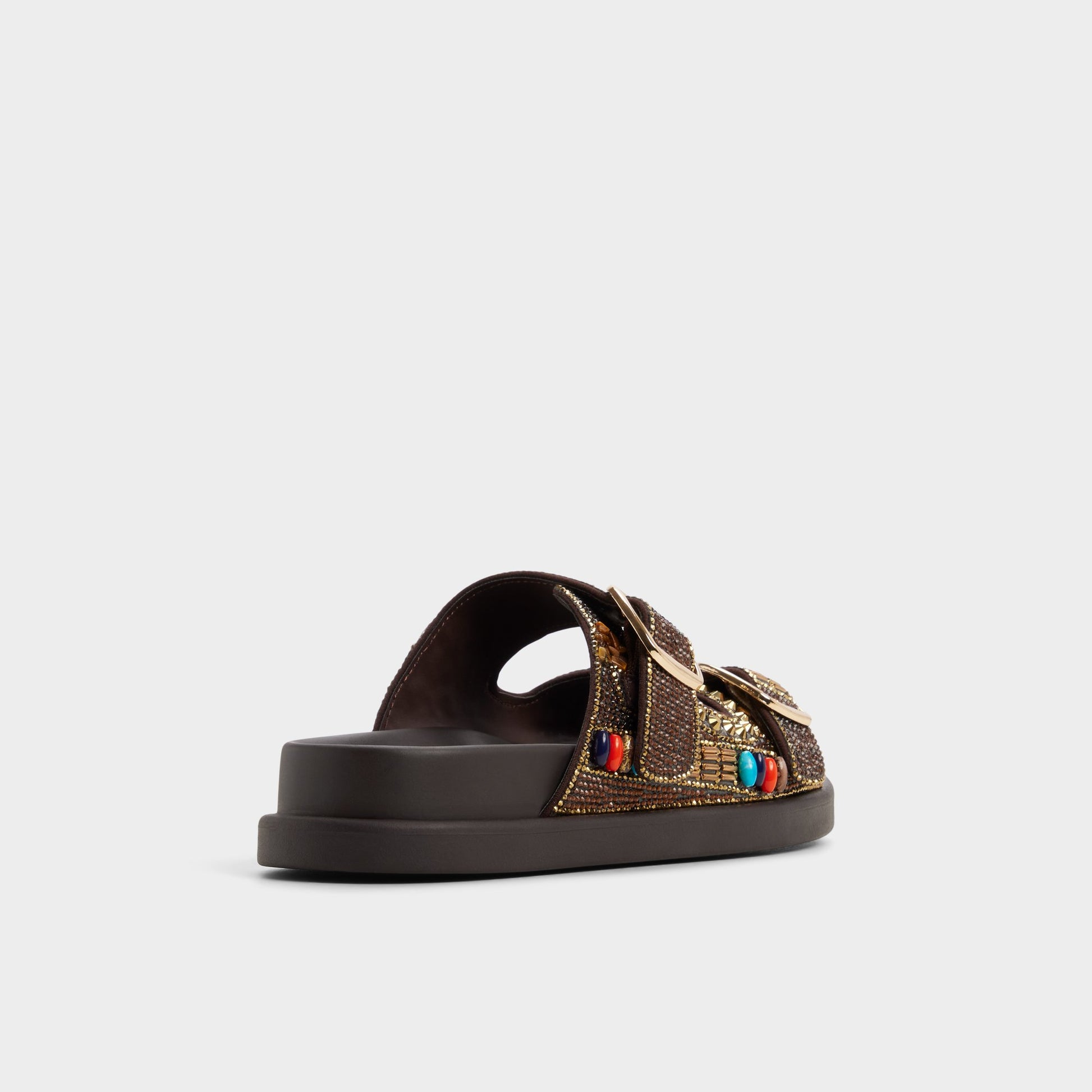 Three-quarter angle of Dark brown Bohochic Footbed sandal's back side