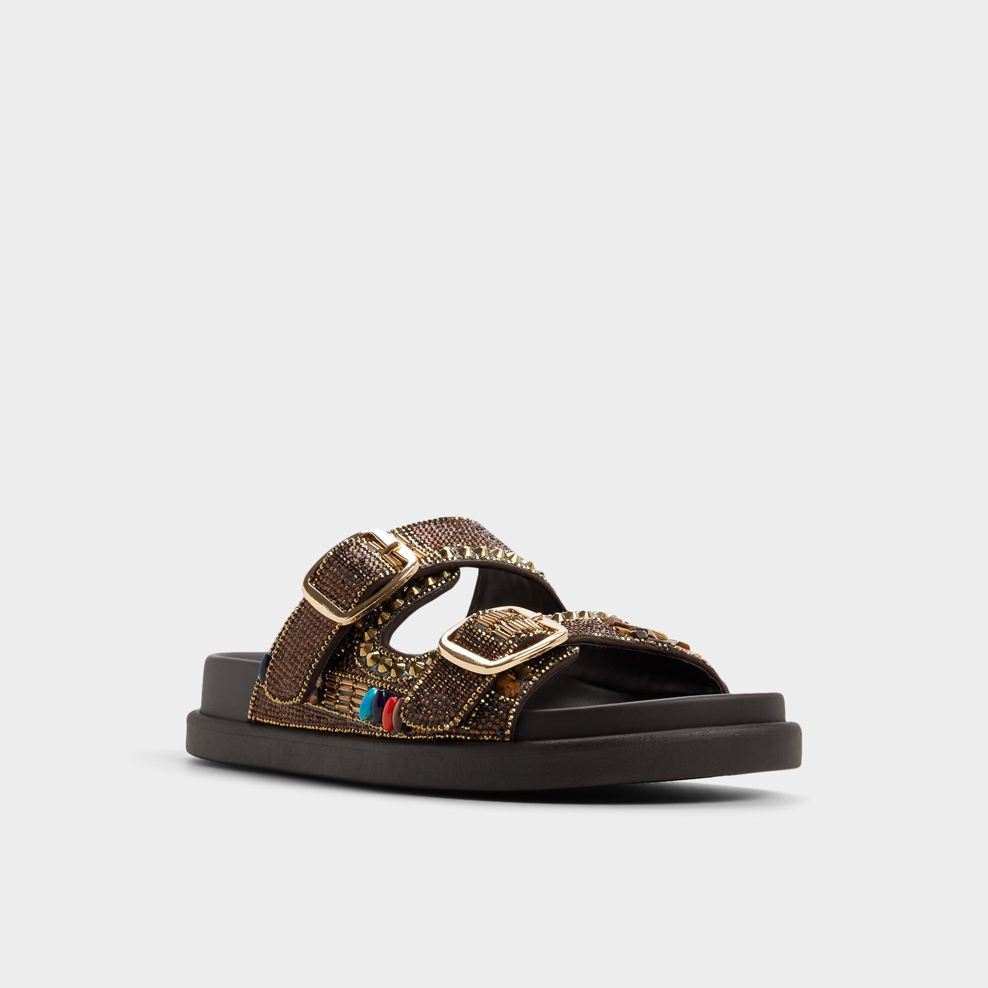 Three-quarter angle of Dark brown Bohochic Footbed sandal's front side
