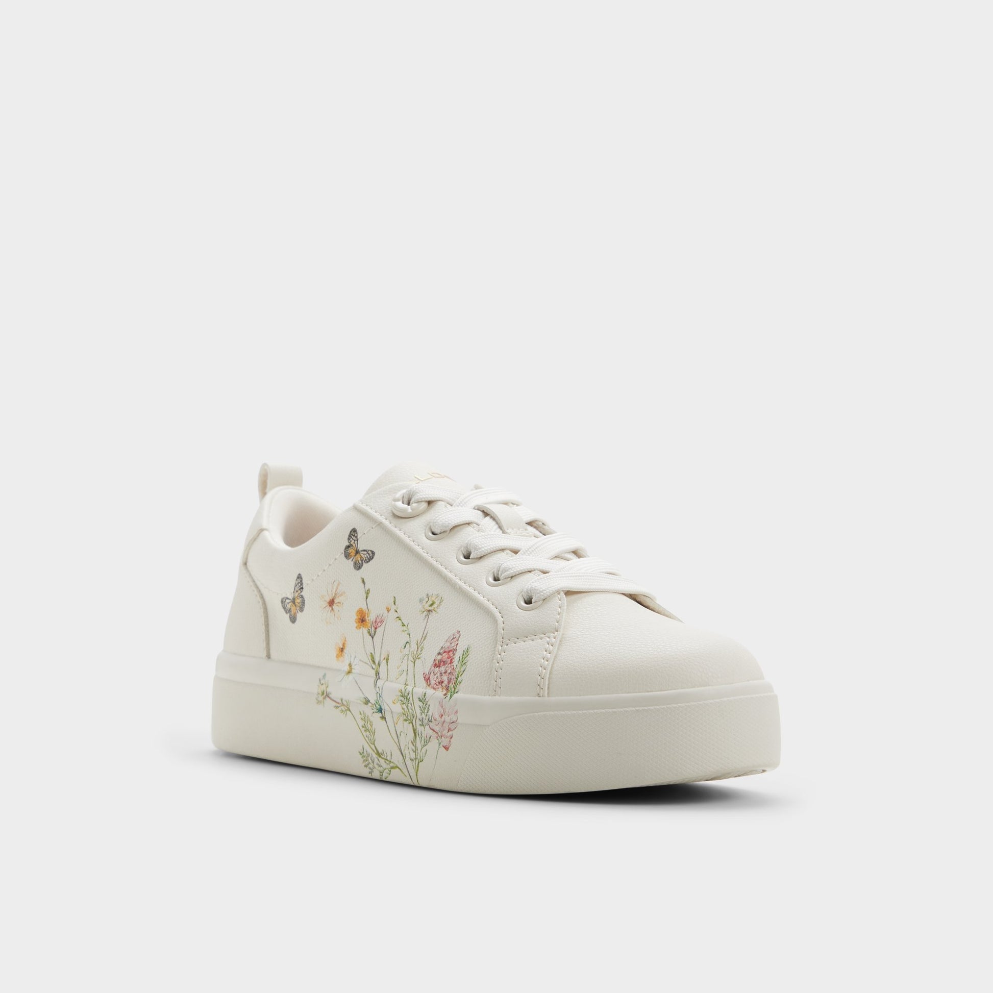 Three-quarter angle of White/multi Wildflowers Sneaker's front side