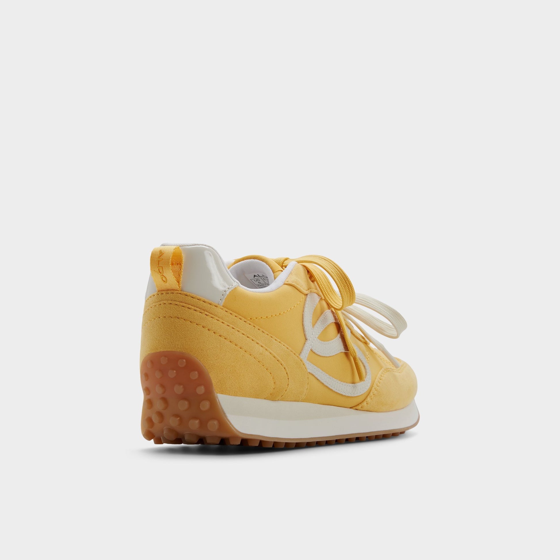 Three-quarter angle of Medium yellow Caely Sneaker's back side