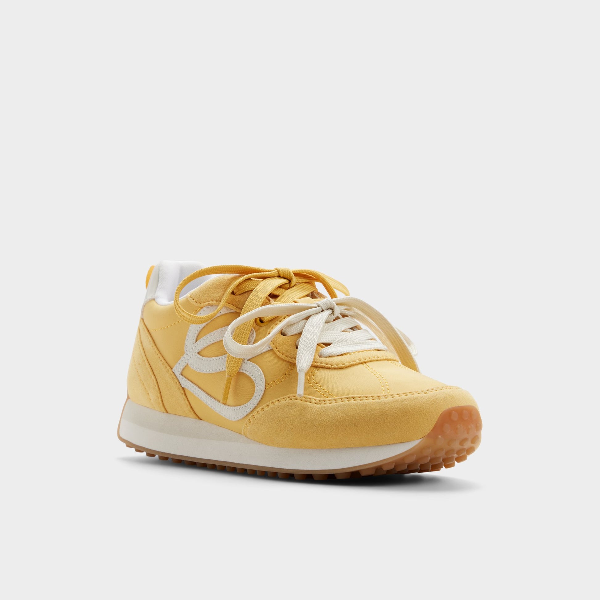 Three-quarter angle of Medium yellow Caely Sneaker's front side