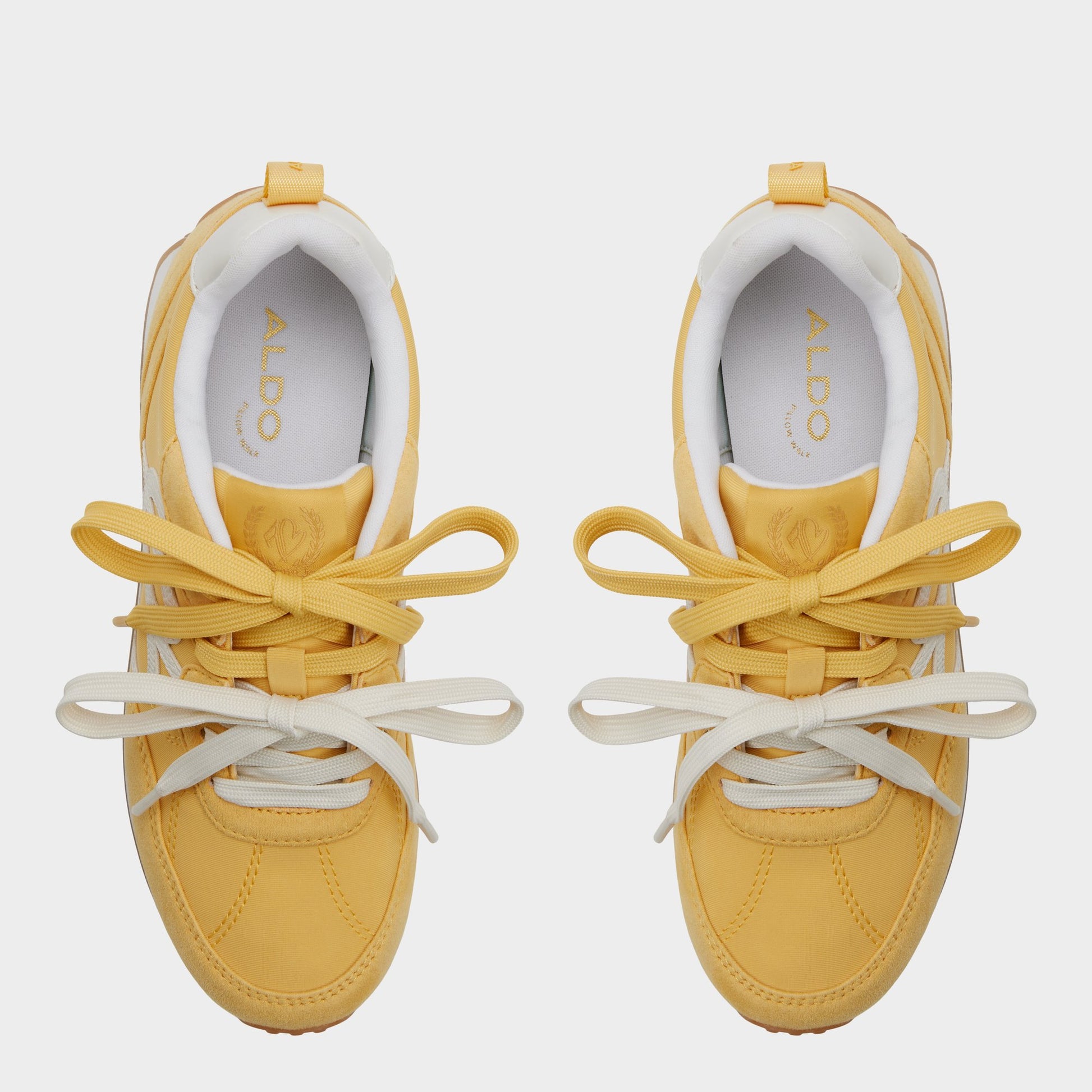 Top-down view of the Medium yellow Caely Sneaker