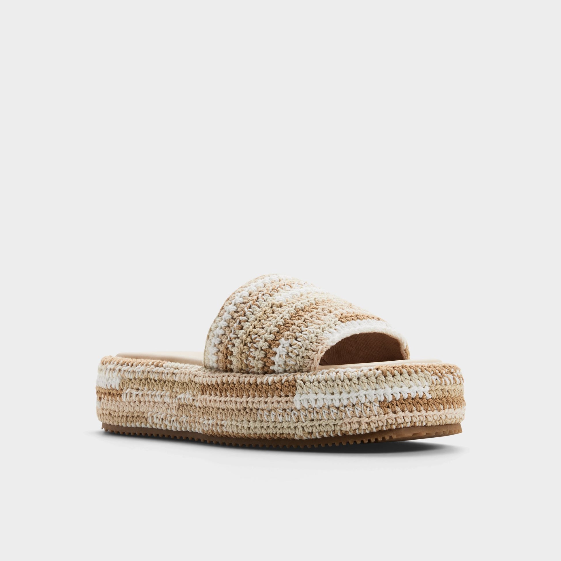 Three-quarter angle of Beige combo Bohemina Slide sandal's front side