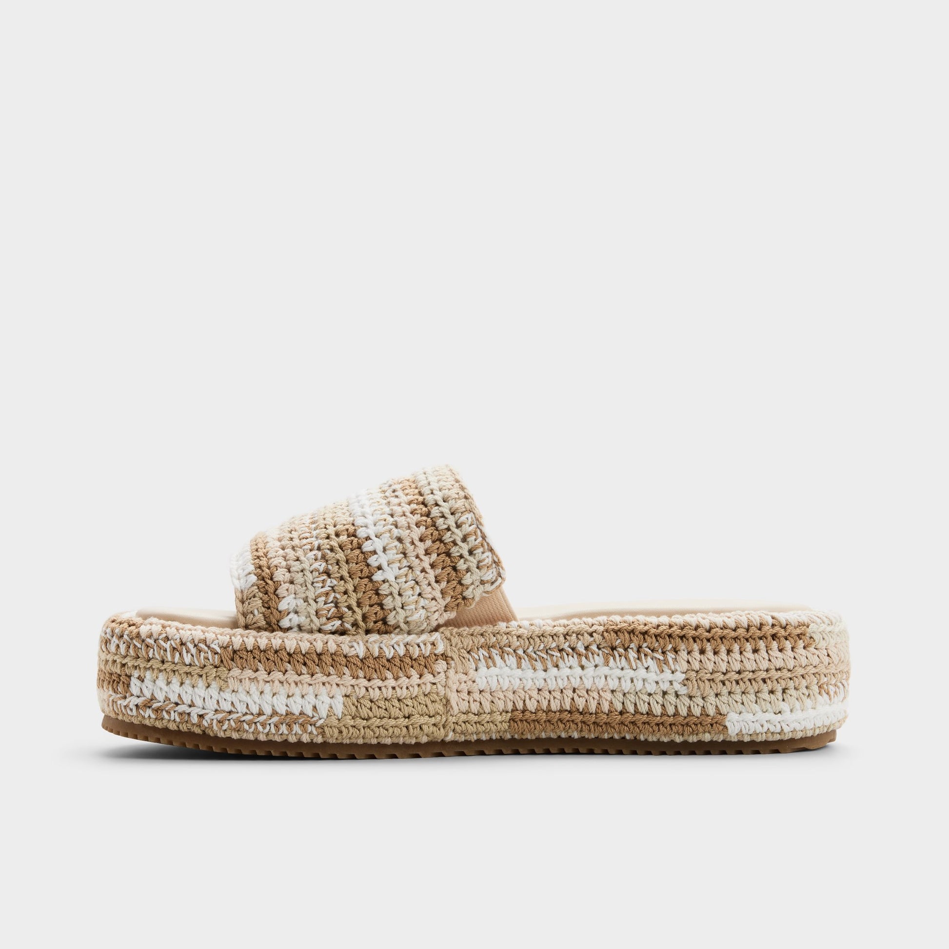 Side view of Beige combo Bohemina Slide sandal