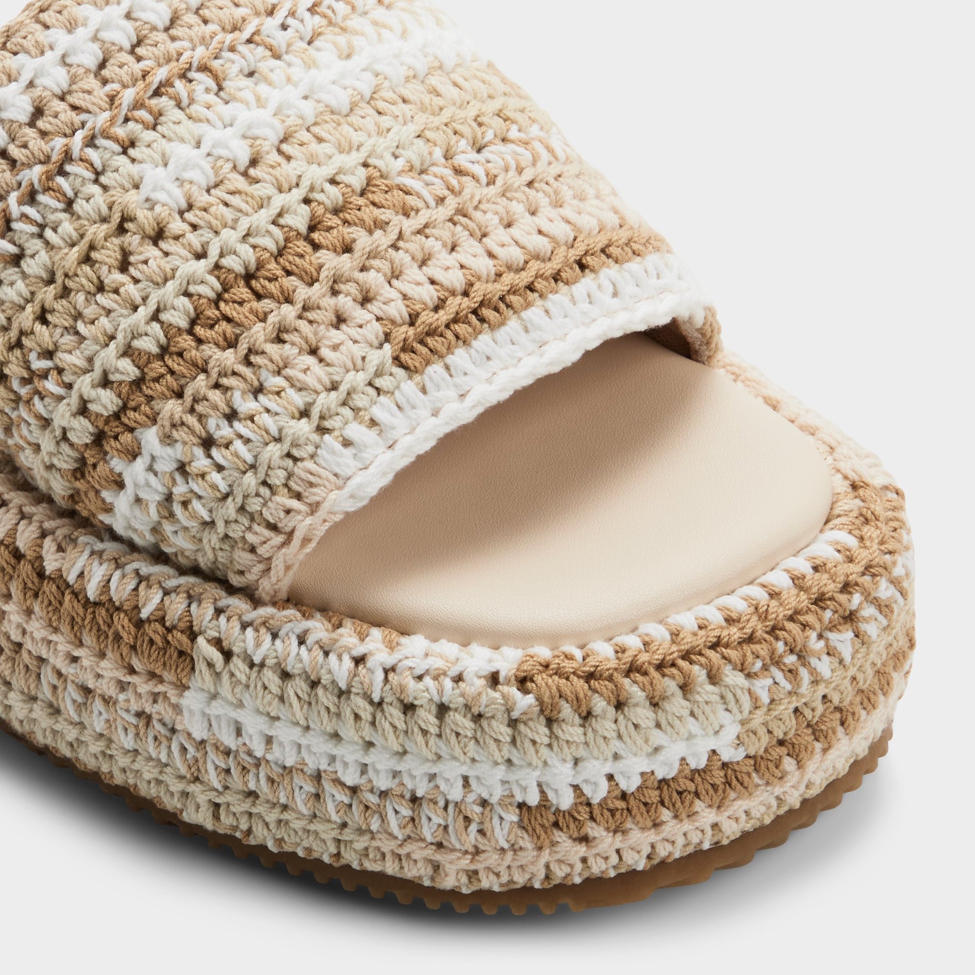 Close-up of the Beige combo Bohemina Slide sandal