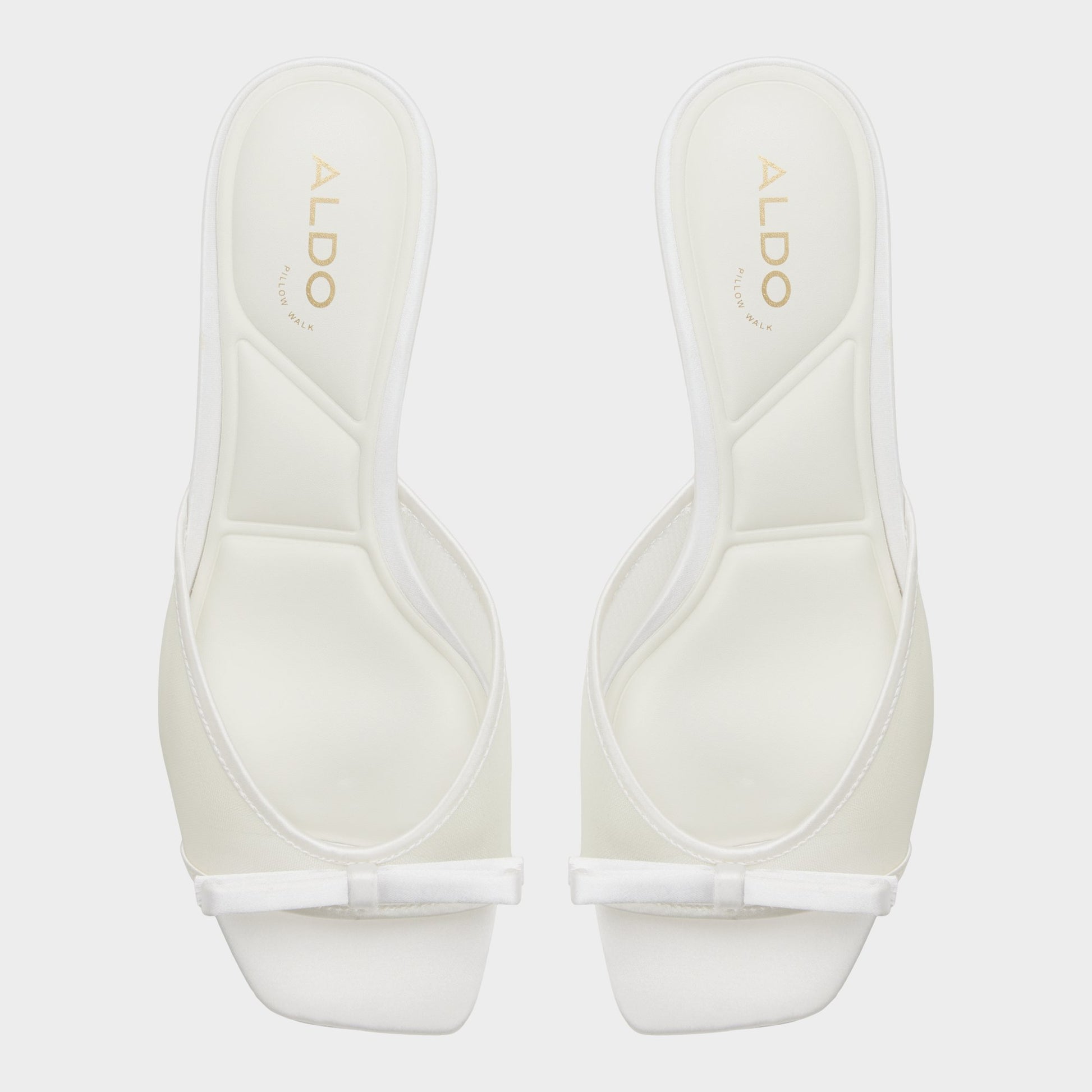 Top-down view of the White/bone Begoniaa Heeled mule