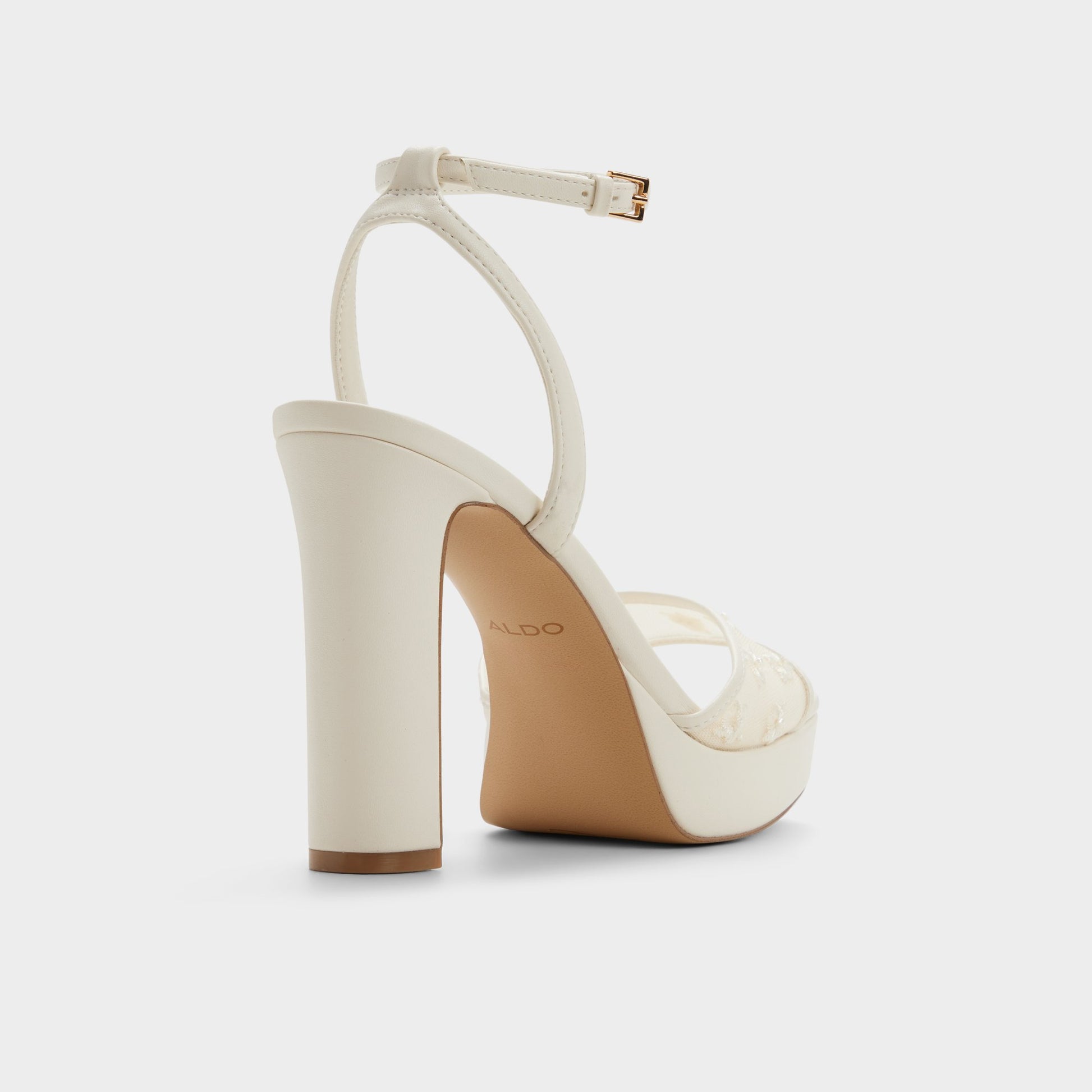 Three-quarter angle of Open white Chicglimmer Strappy heeled sandal's back side