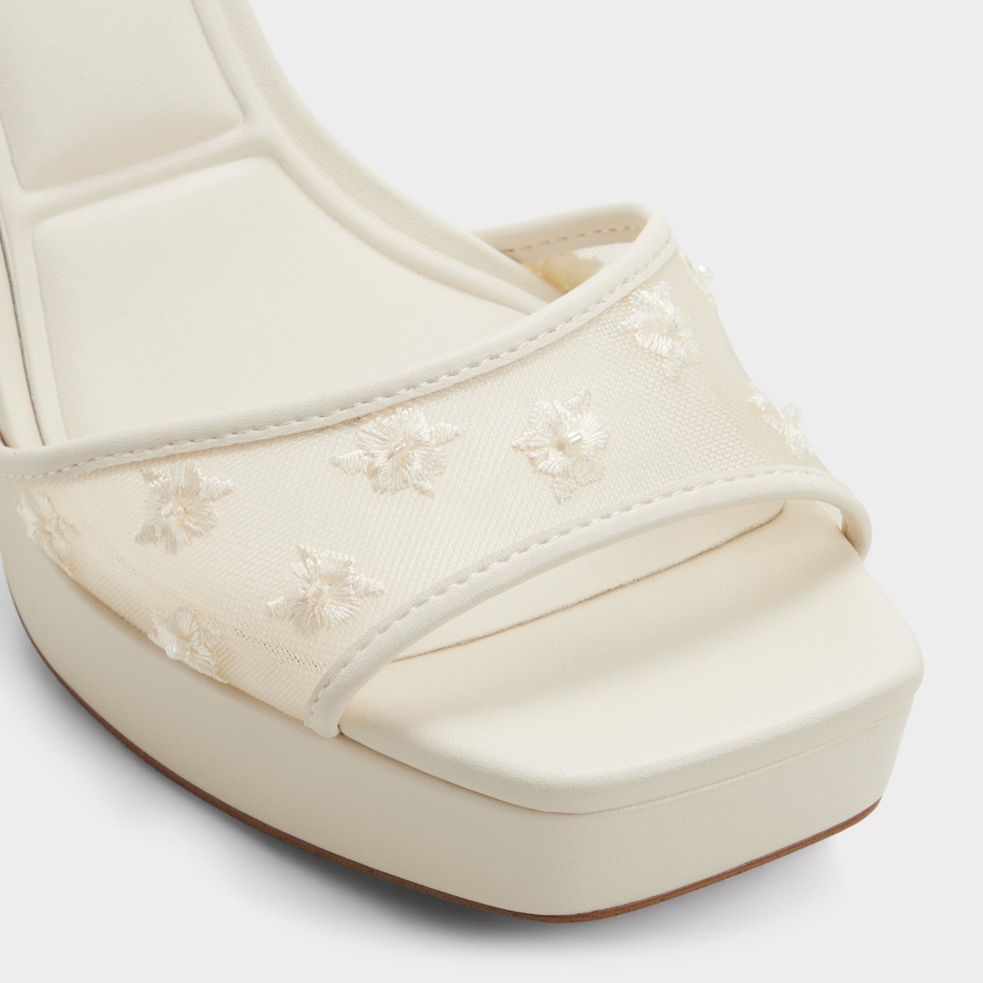 Close-up of the Open white Chicglimmer Strappy heeled sandal