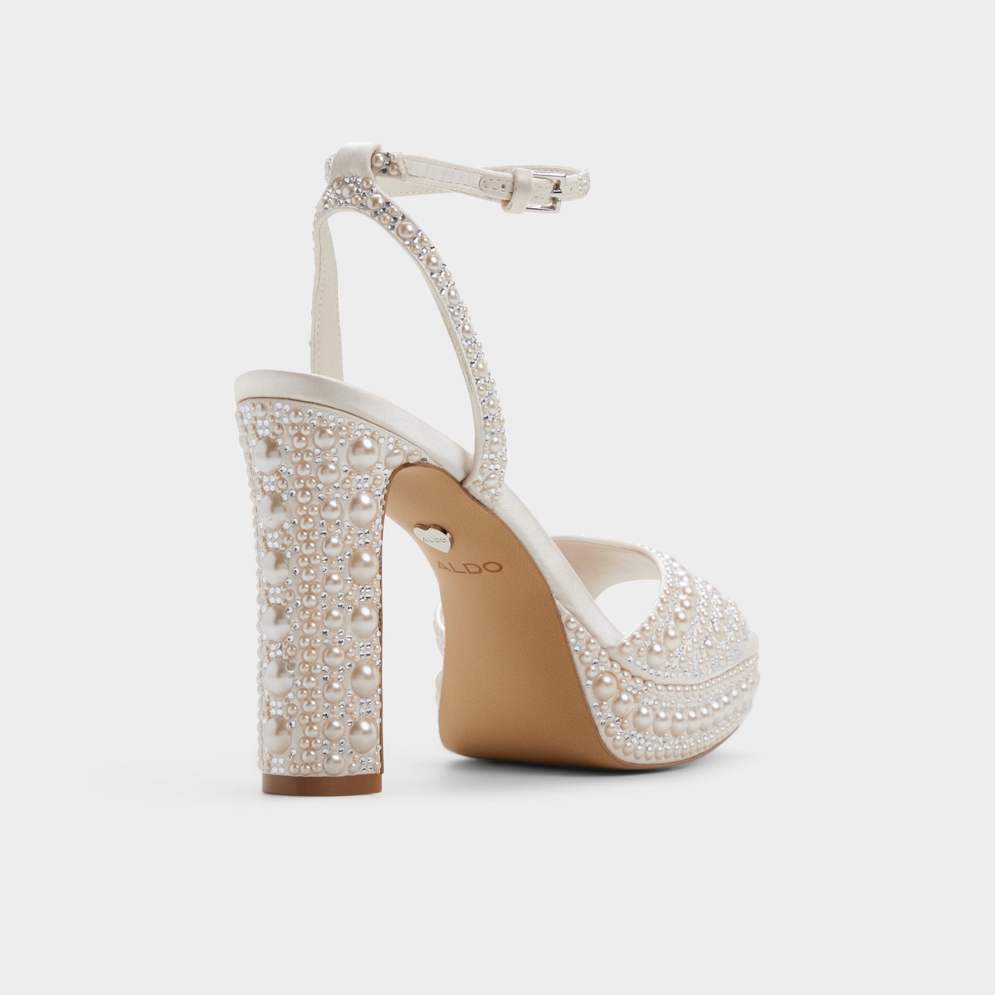 Three-quarter angle of Other white Chicgleam Strappy heeled sandal's back side