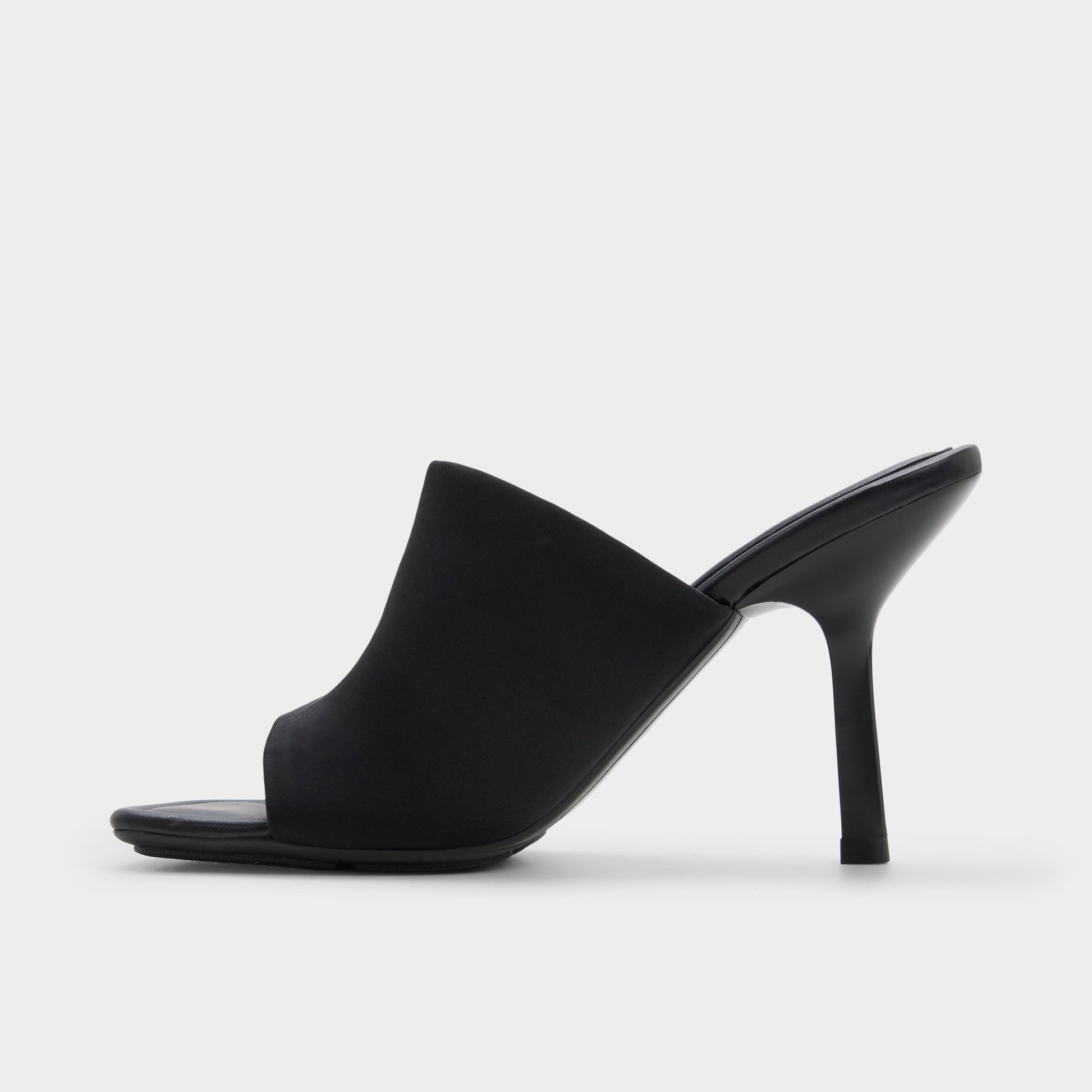 Side view of Black Eviey Heeled mule