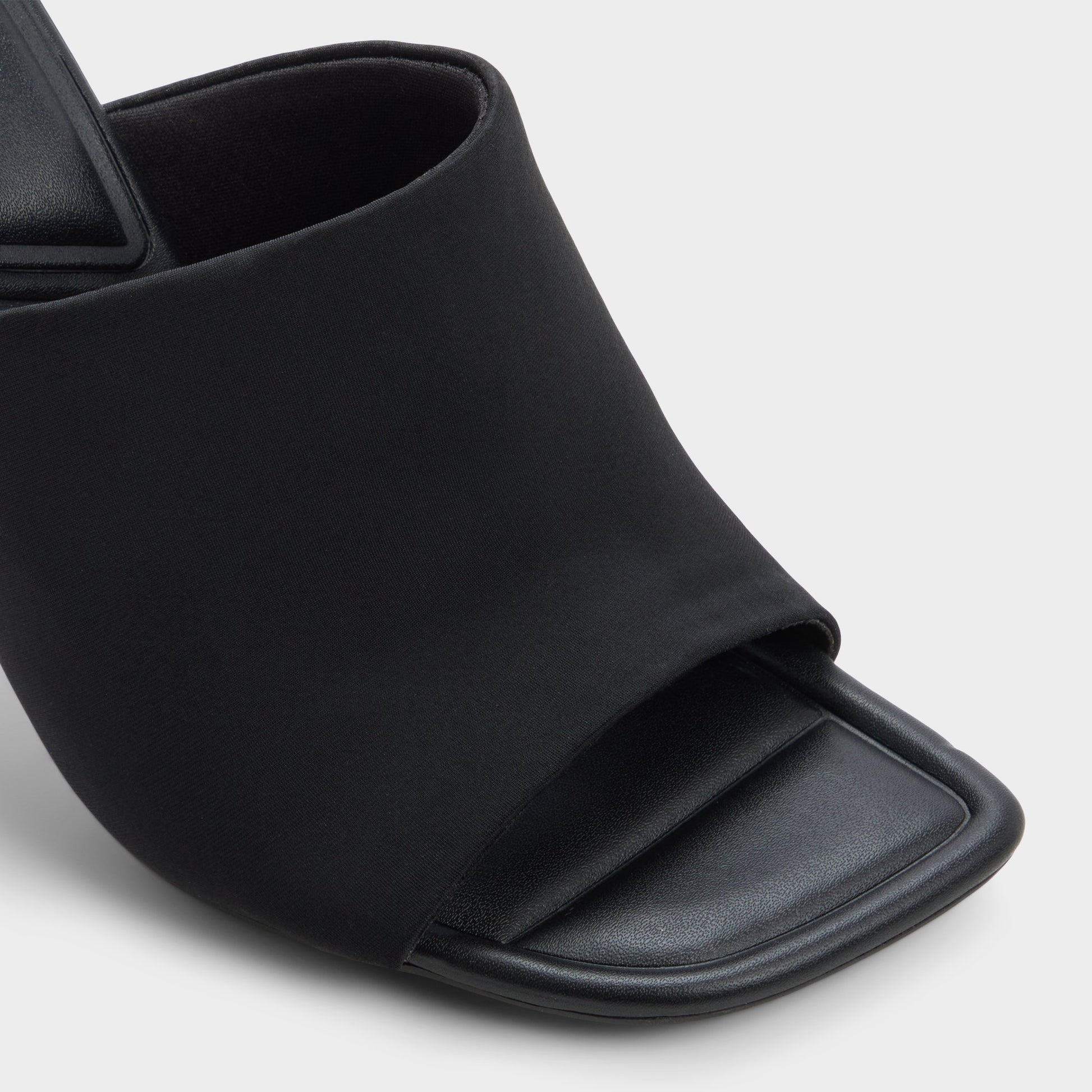 Close-up of the Black Eviey Heeled mule