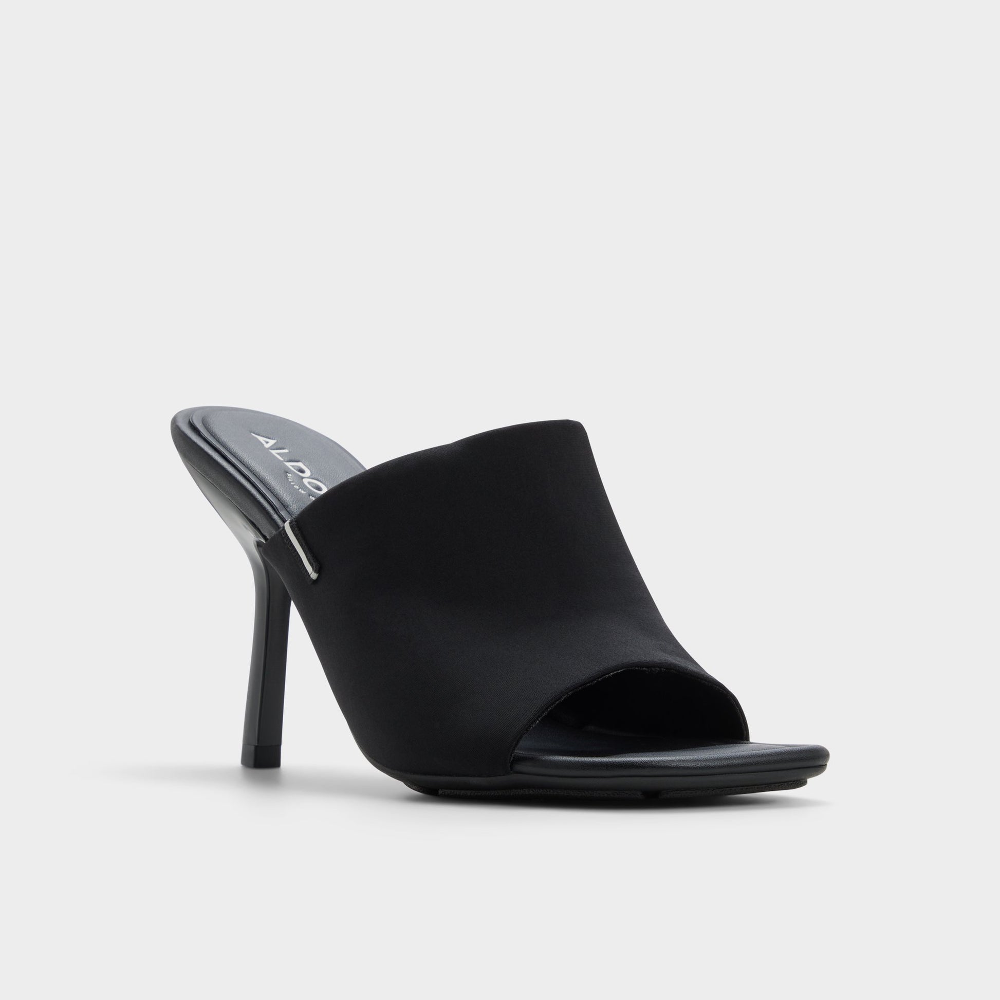Three-quarter angle of Black Eviey Heeled mule's front side