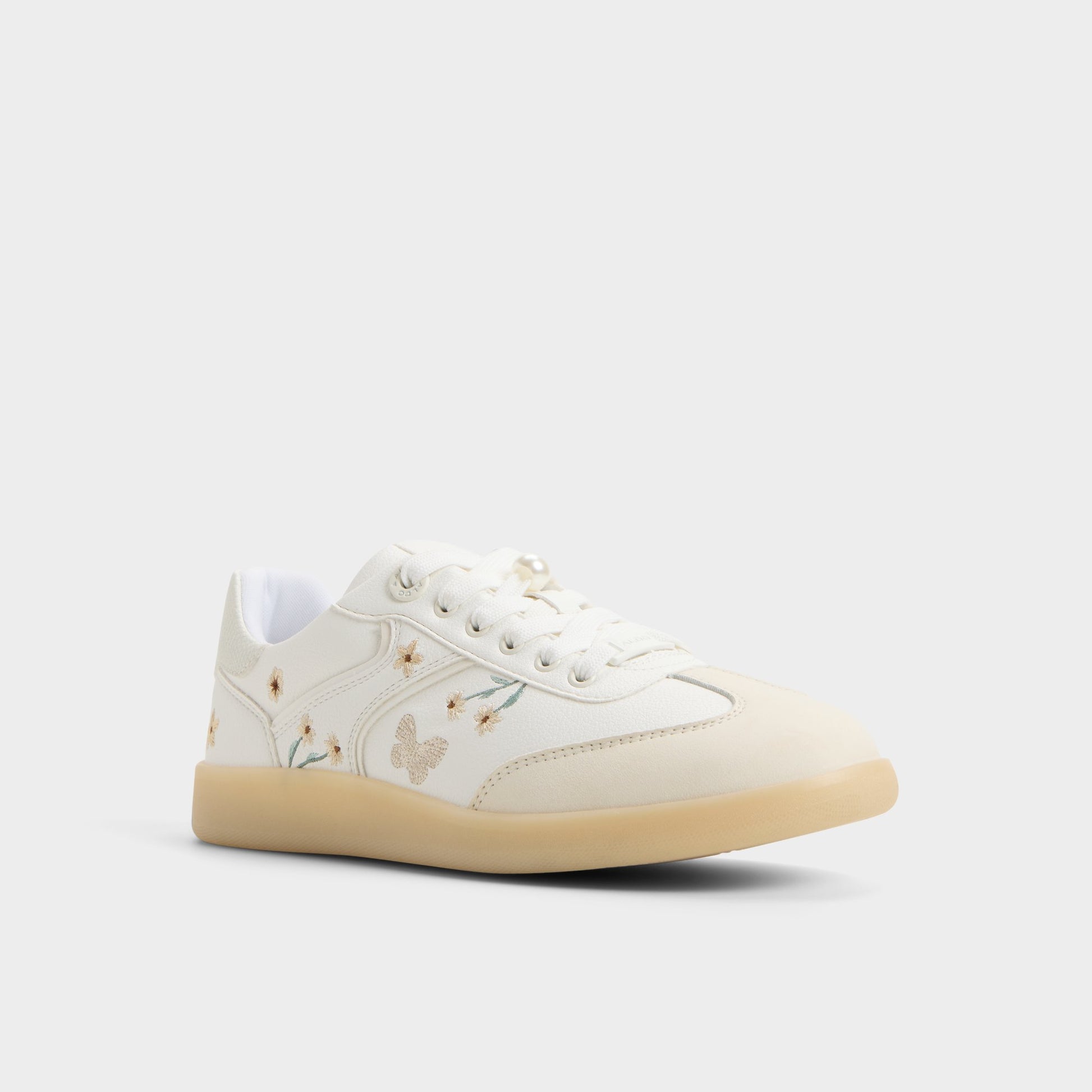 Three-quarter angle of White/multi Erilg Sneaker's front side