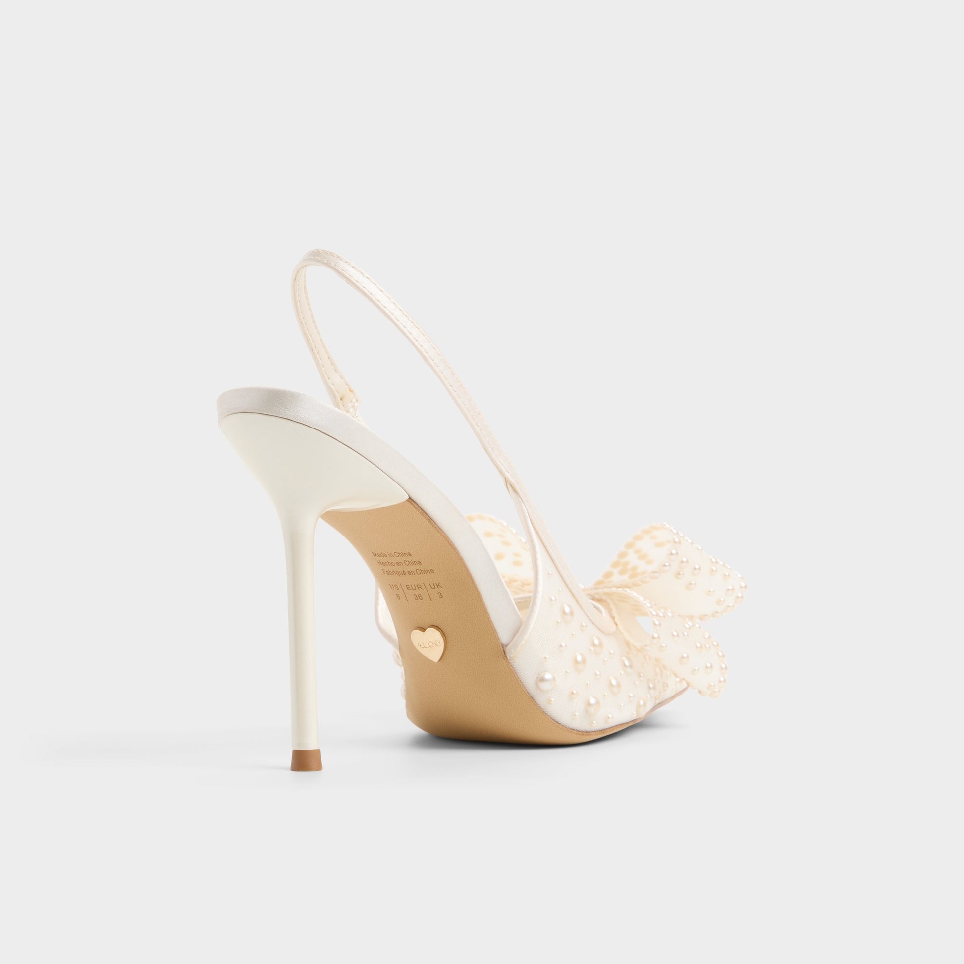 Three-quarter angle of Other white Anastasiaa Slingback heel's back side