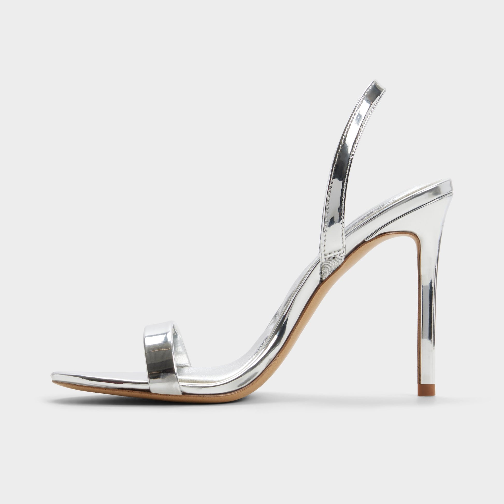 Side view of Silver Quinney Slingback heeled sandal