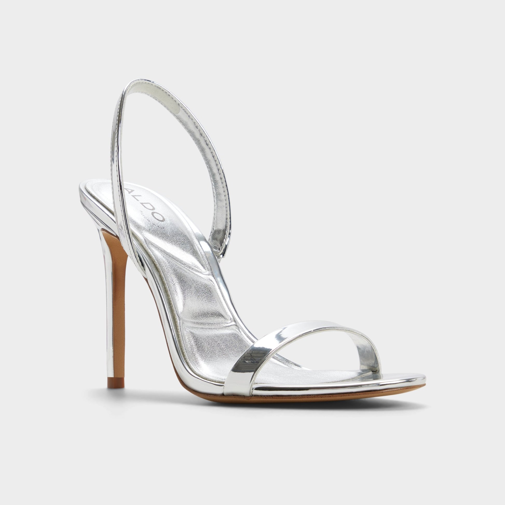 Three-quarter angle of Silver Quinney Slingback heeled sandal's front side