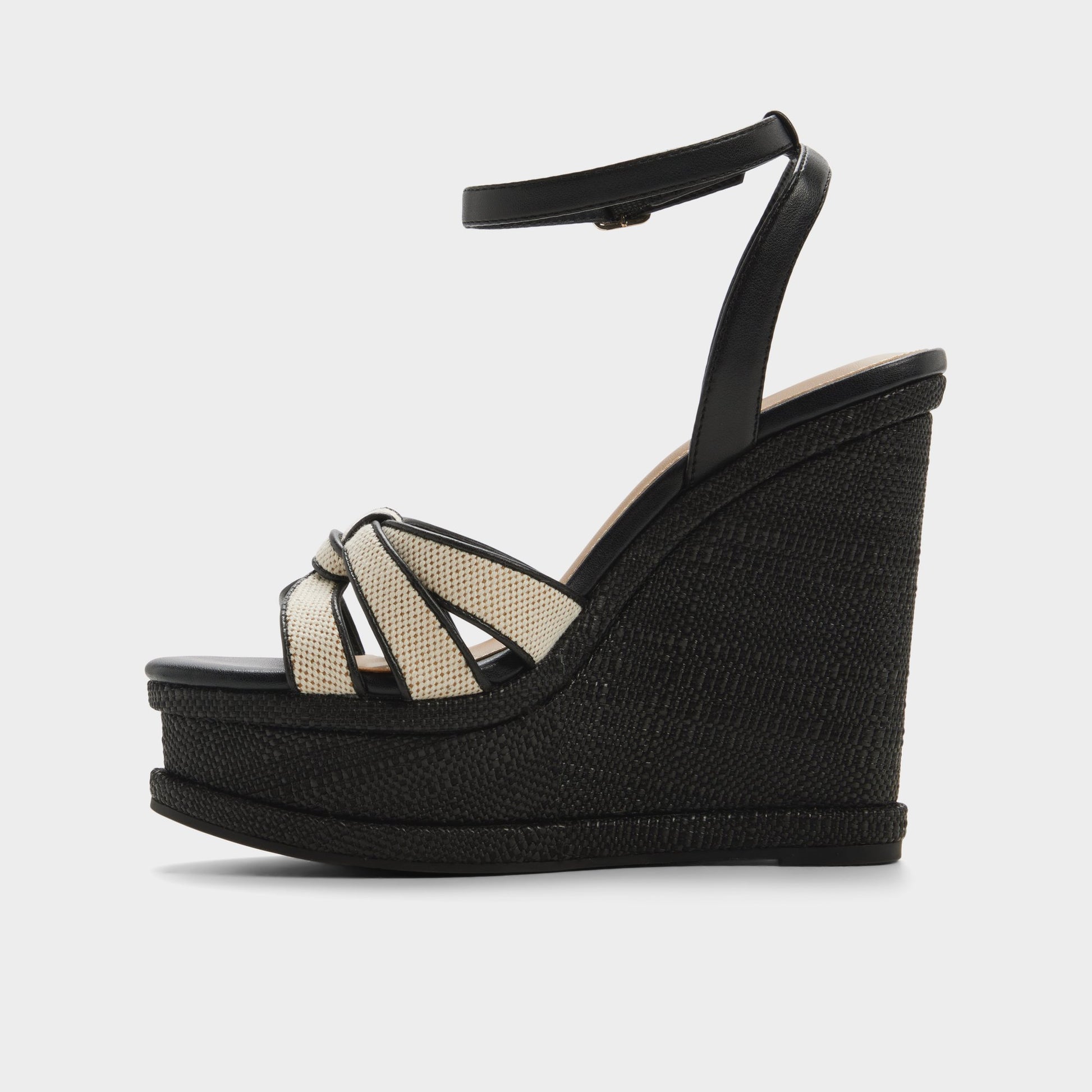 Side view of Black combo Esmerie Wedge sandal