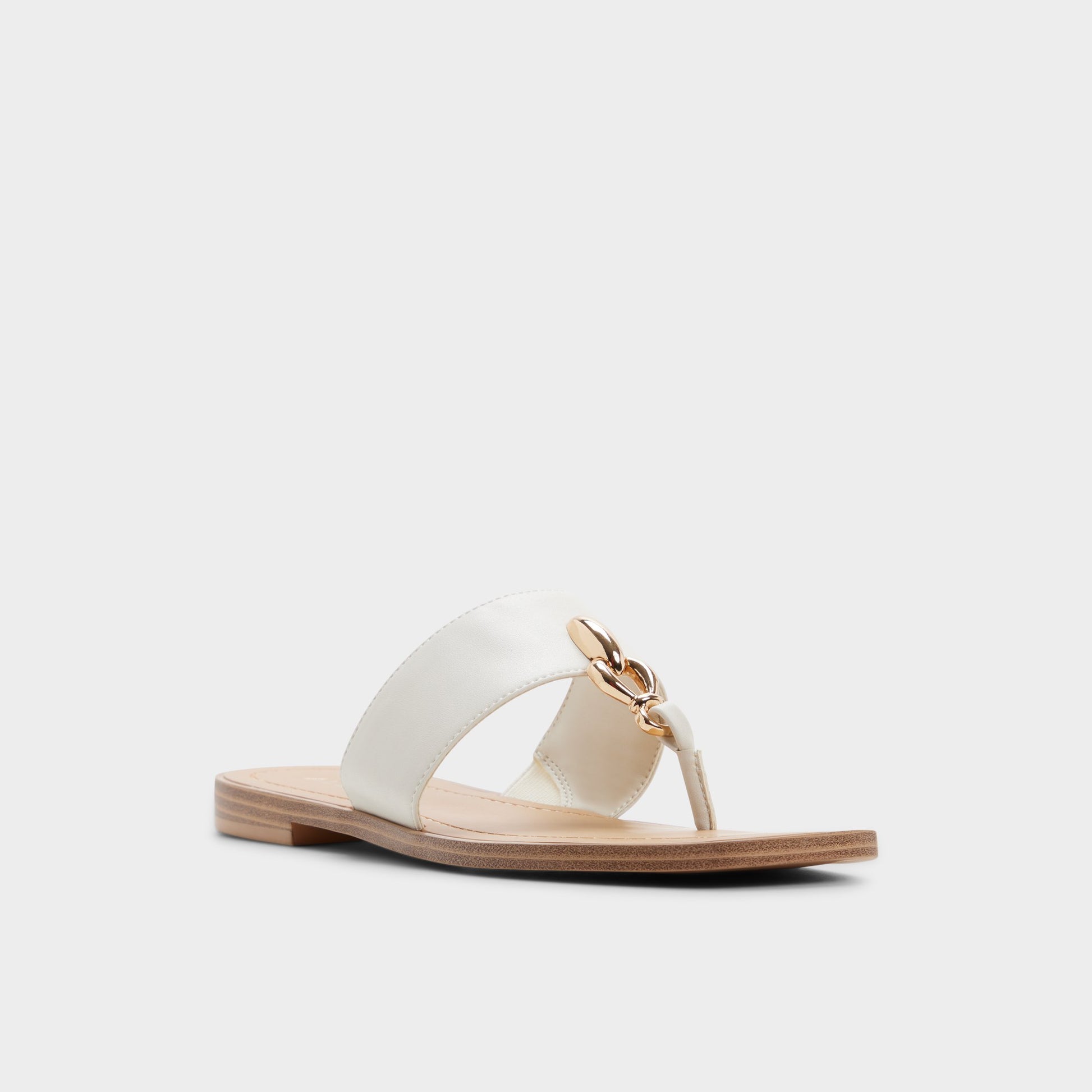 Three-quarter angle of White/bone Madaline T-strap sandal's front side