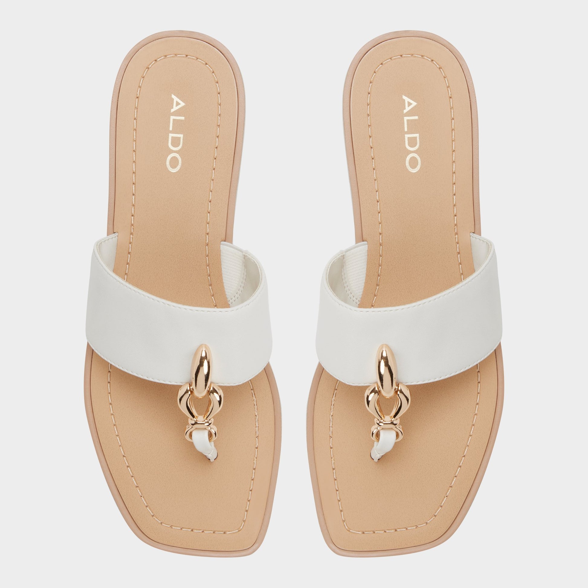 Top-down view of the White/bone Madaline T-strap sandal
