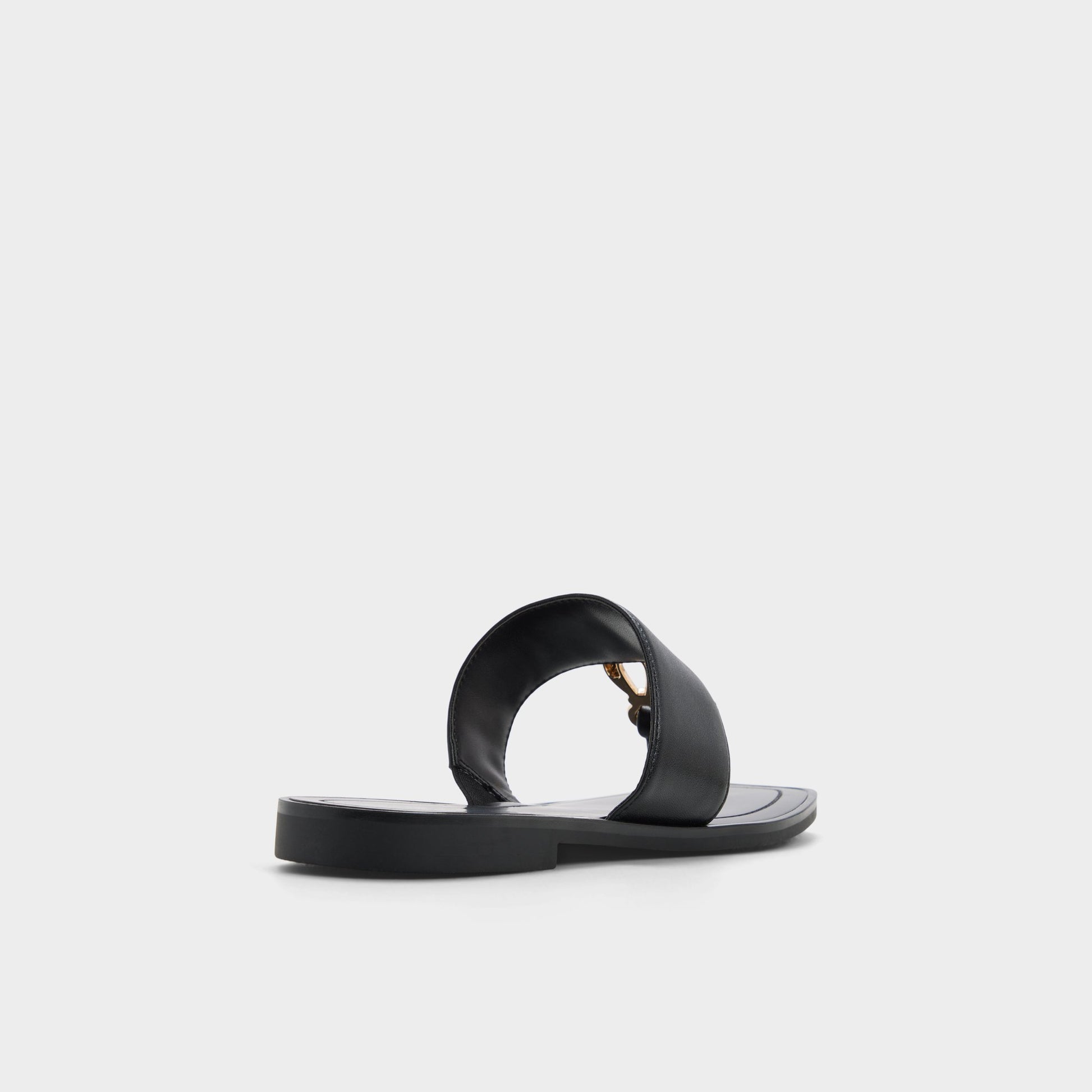 Three-quarter angle of Black Madaline T-strap sandal's back side