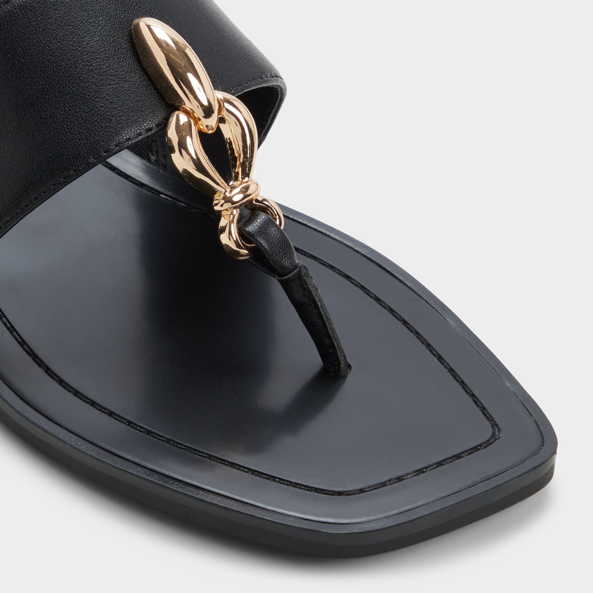 Close-up of the Black Madaline T-strap sandal