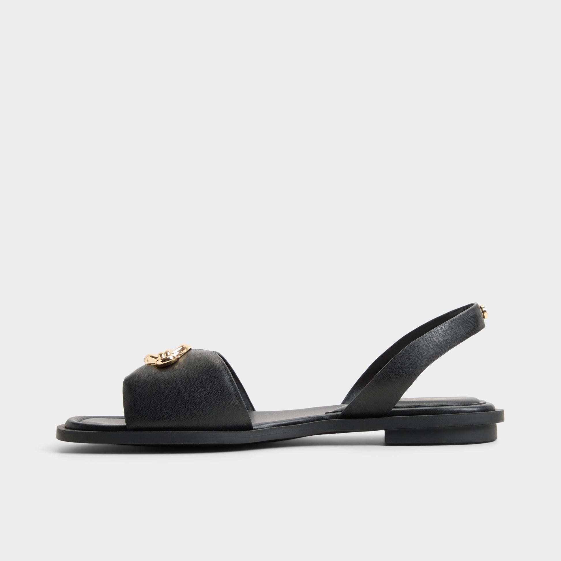 Side view of Black Calelian Flat sandal