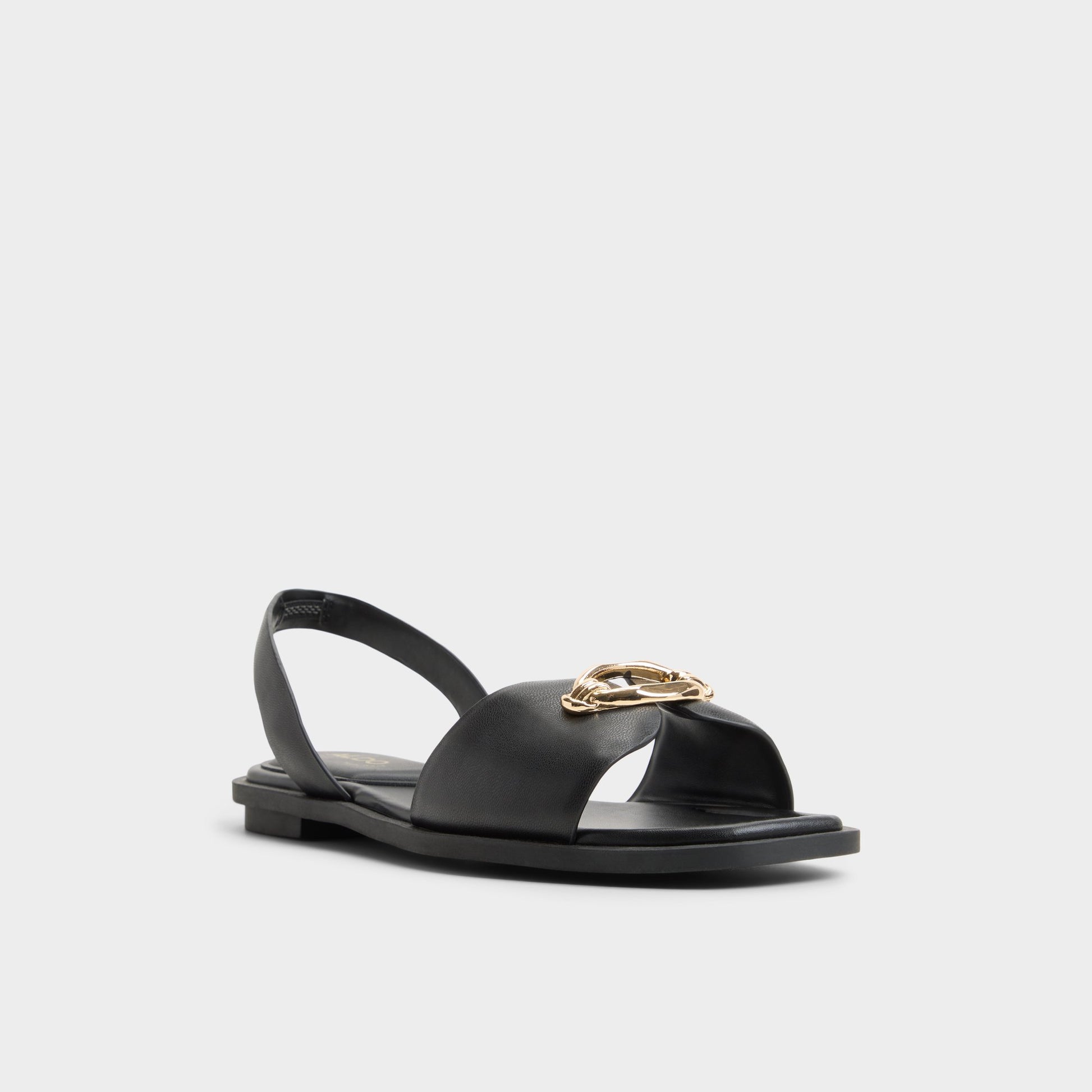 Three-quarter angle of Black Calelian Flat sandal's front side