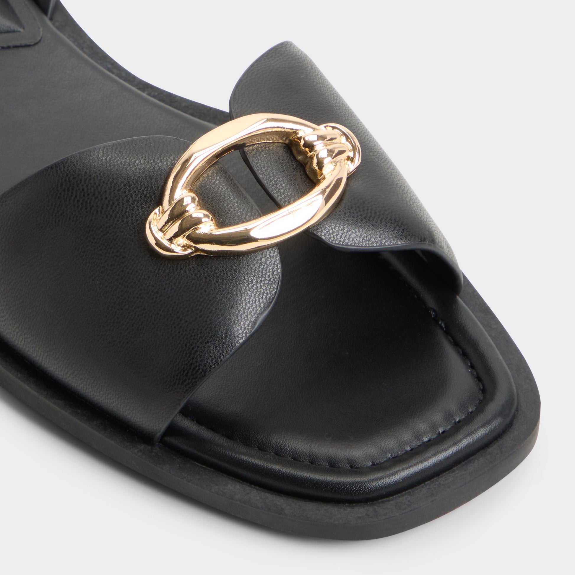 Close-up of the Black Calelian Flat sandal