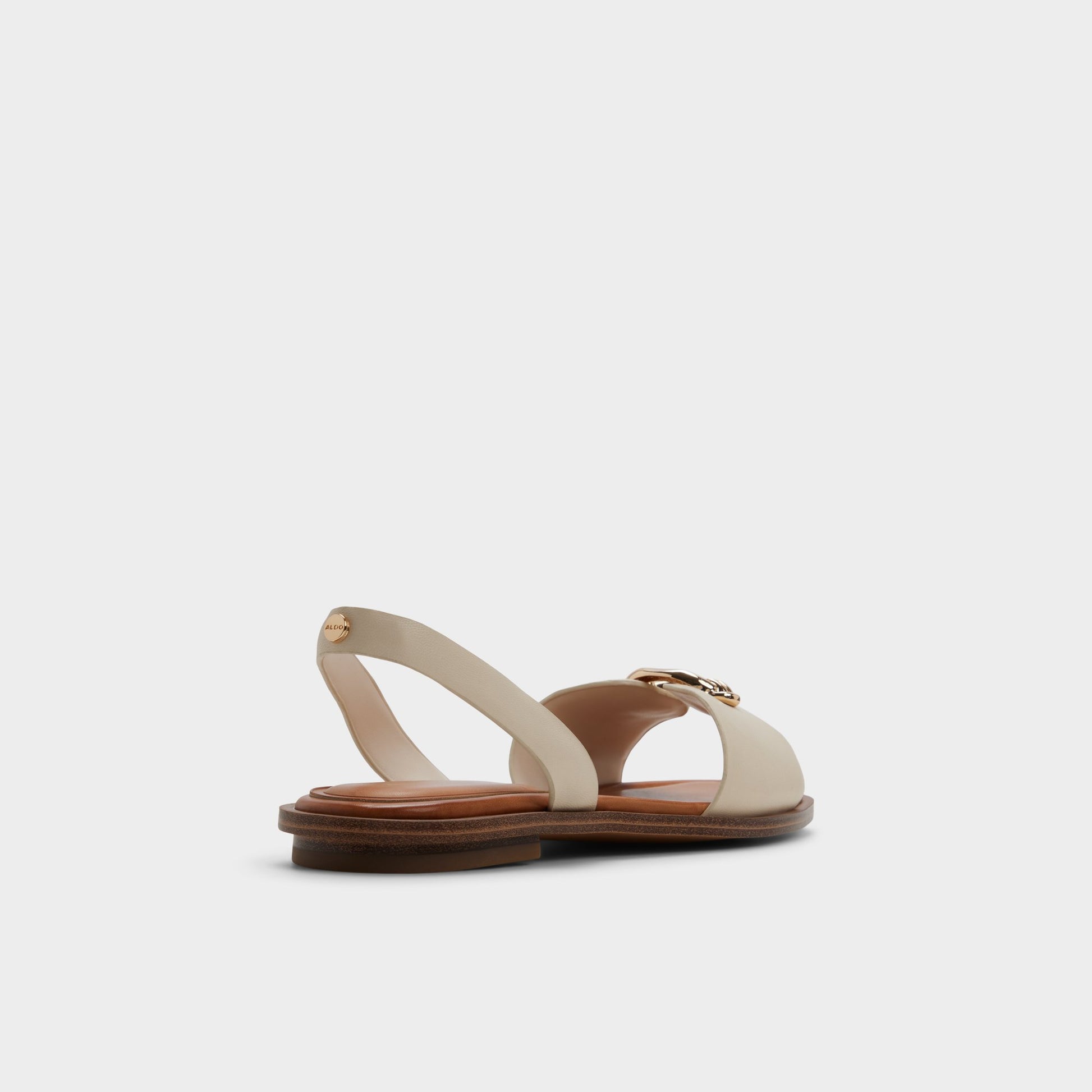 Three-quarter angle of Other white Calelian Flat sandal's back side
