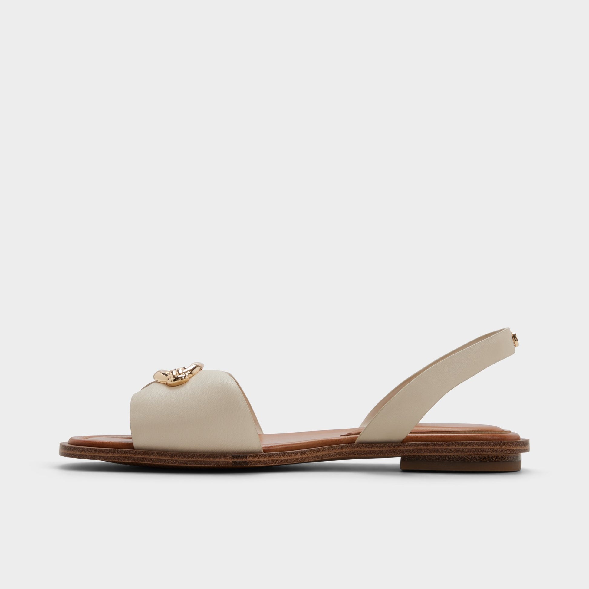 Side view of Other white Calelian Flat sandal