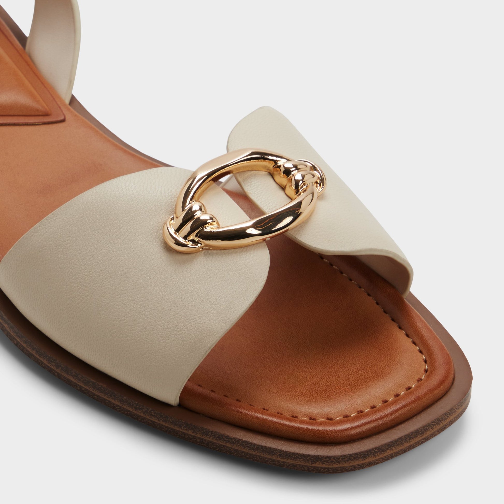 Close-up of the Other white Calelian Flat sandal