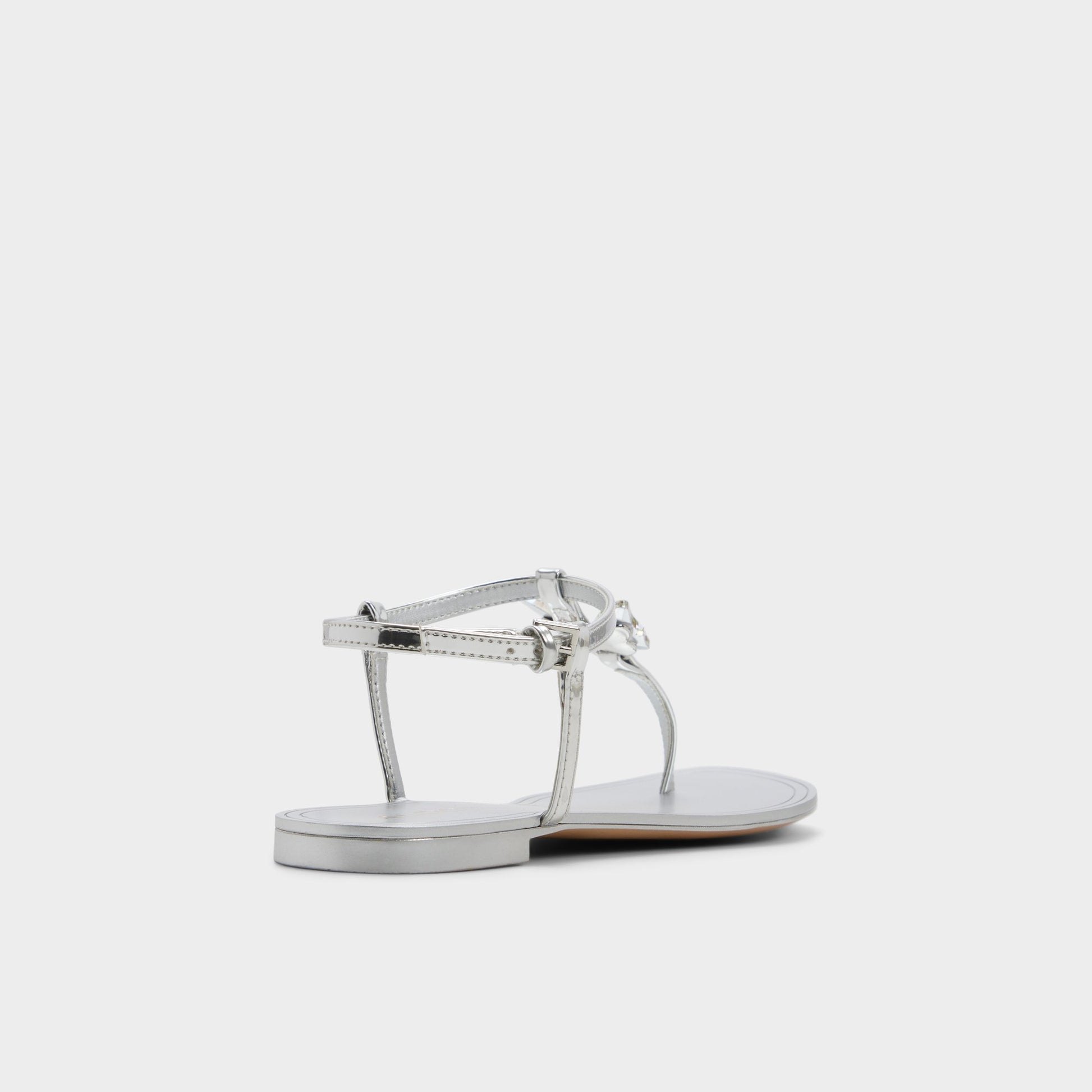 Three-quarter angle of Silver Farfallina T-strap sandal's back side