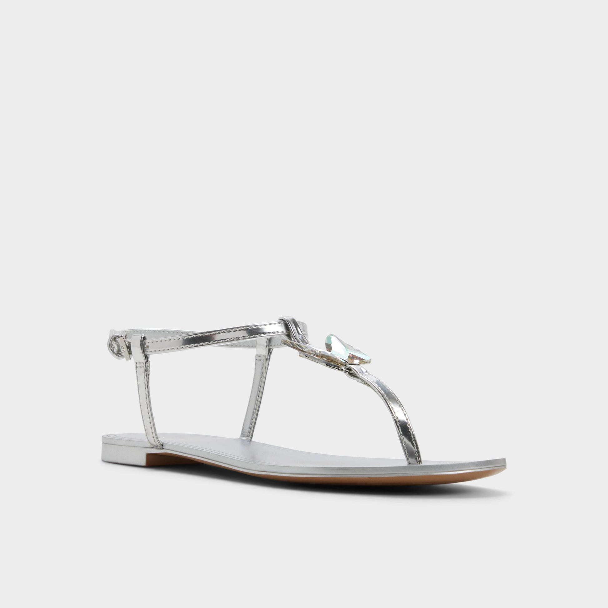 Three-quarter angle of Silver Farfallina T-strap sandal's front side