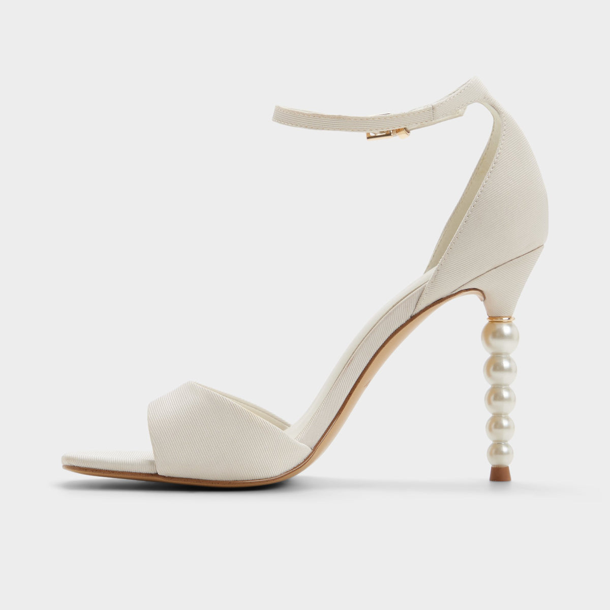 Side view of White/bone Pearletta