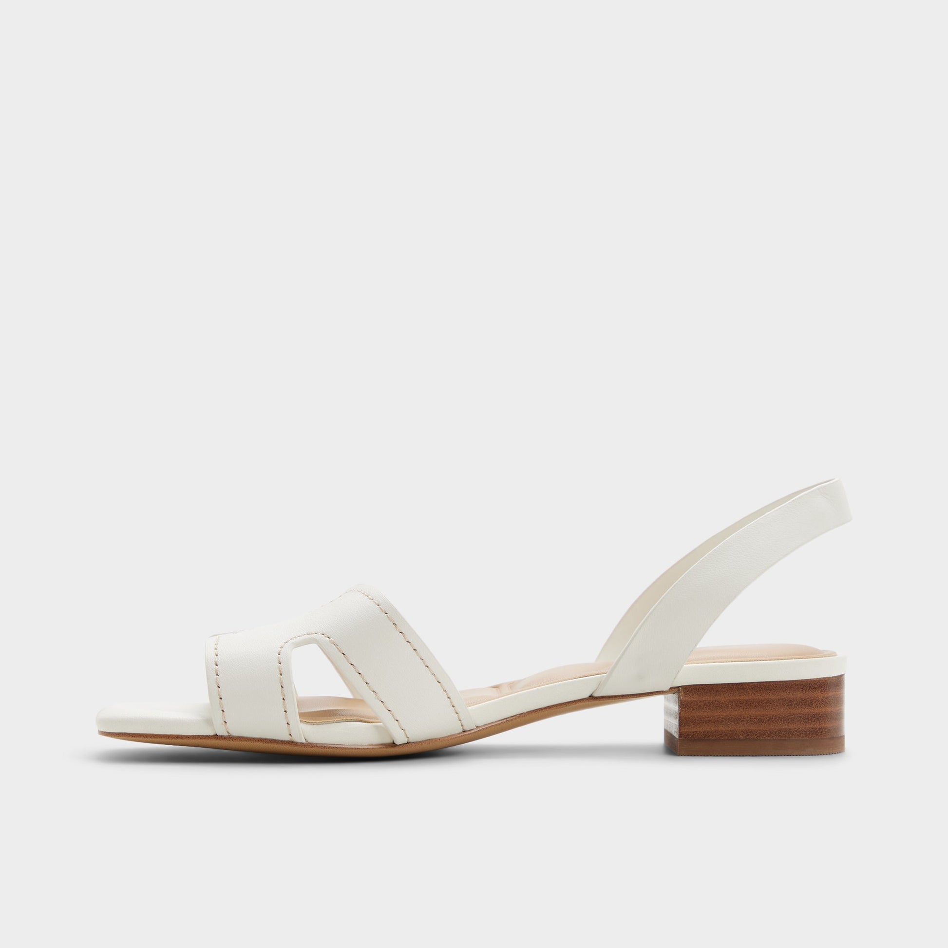 Side view of White/bone Javamannon Strappy heeled sandal