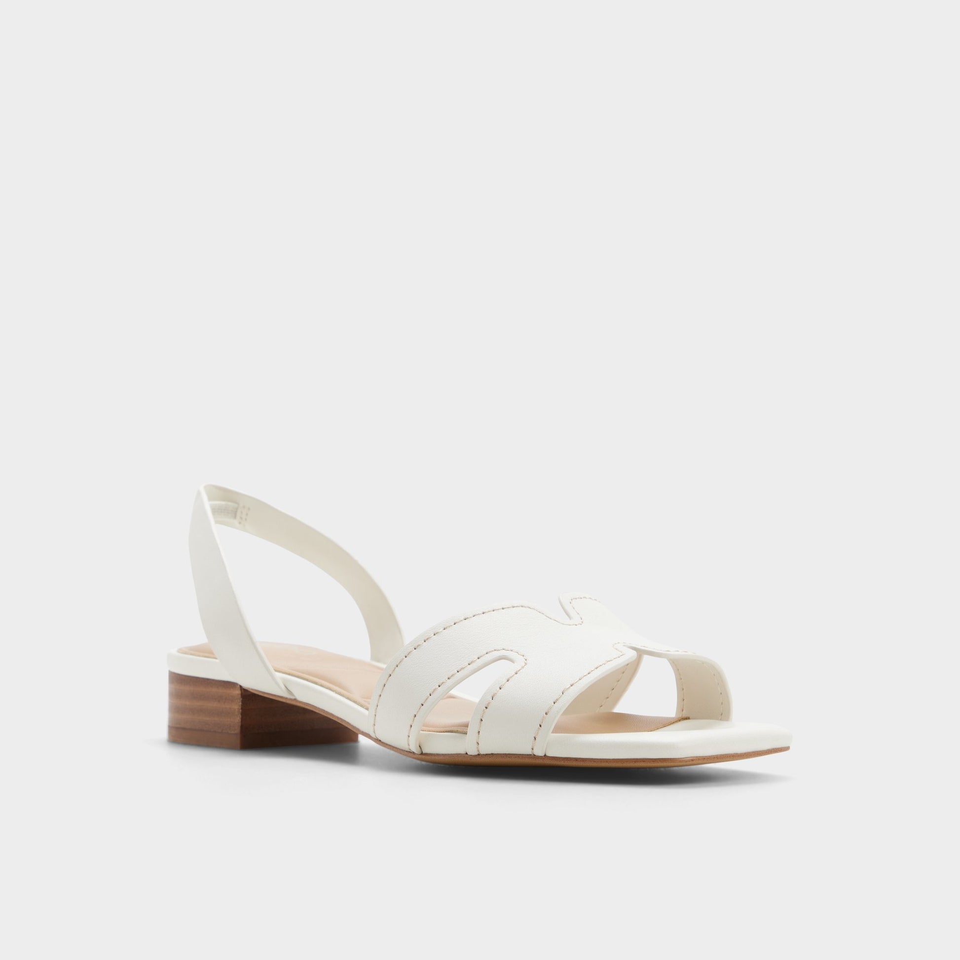Three-quarter angle of White/bone Javamannon Strappy heeled sandal's front side