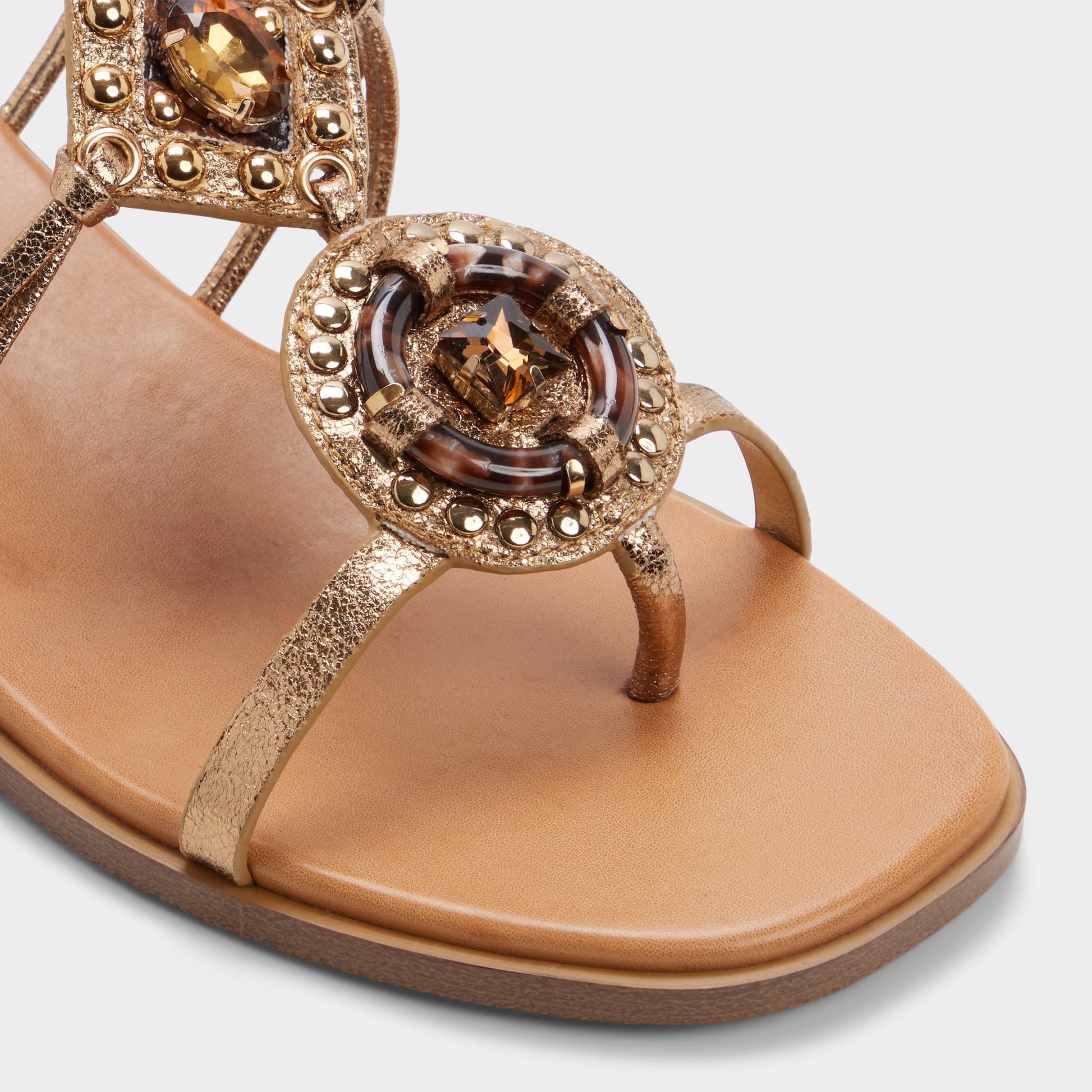 Close-up of the Gold Sandjewel Gladiator sandal