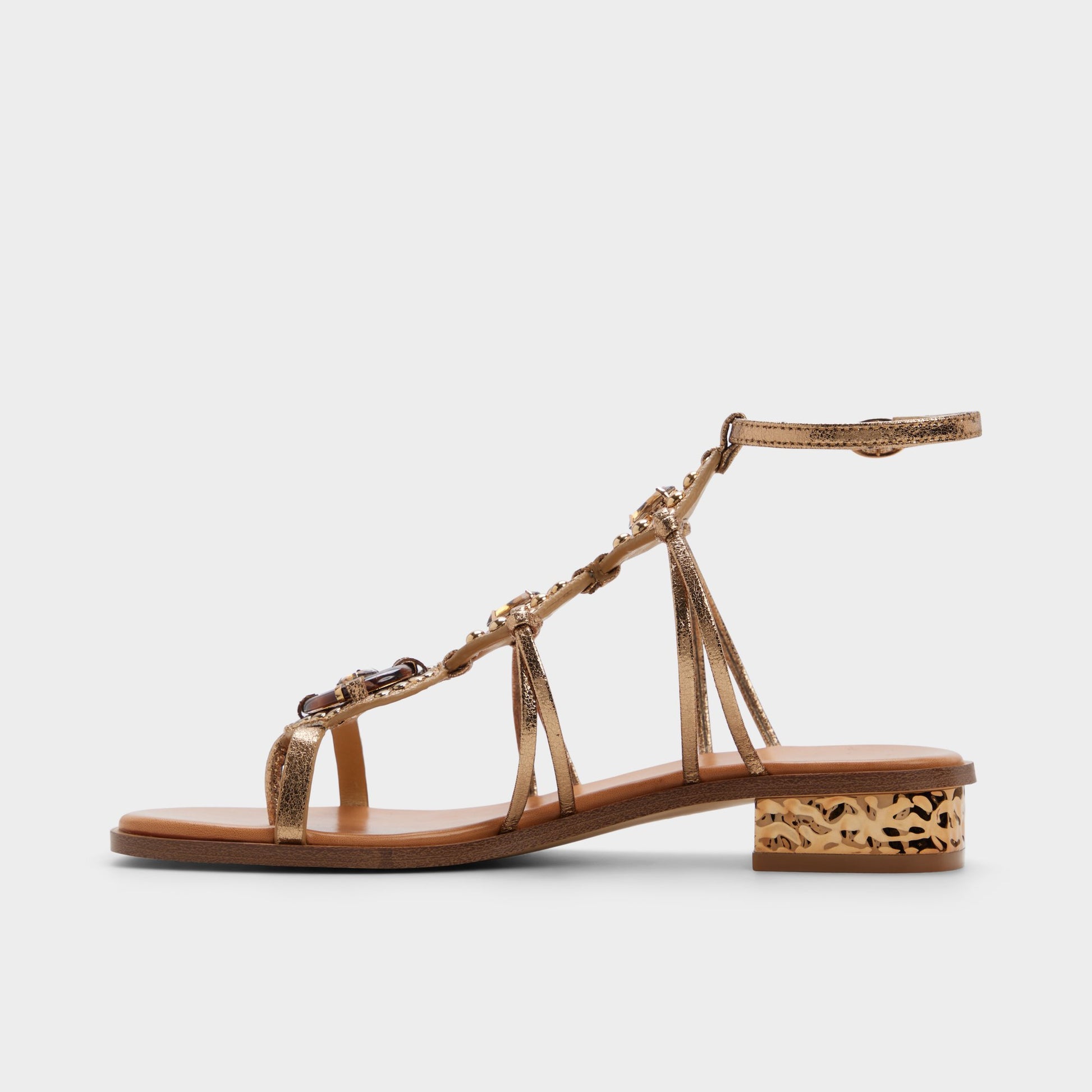 Side view of Gold Sandjewel Gladiator sandal
