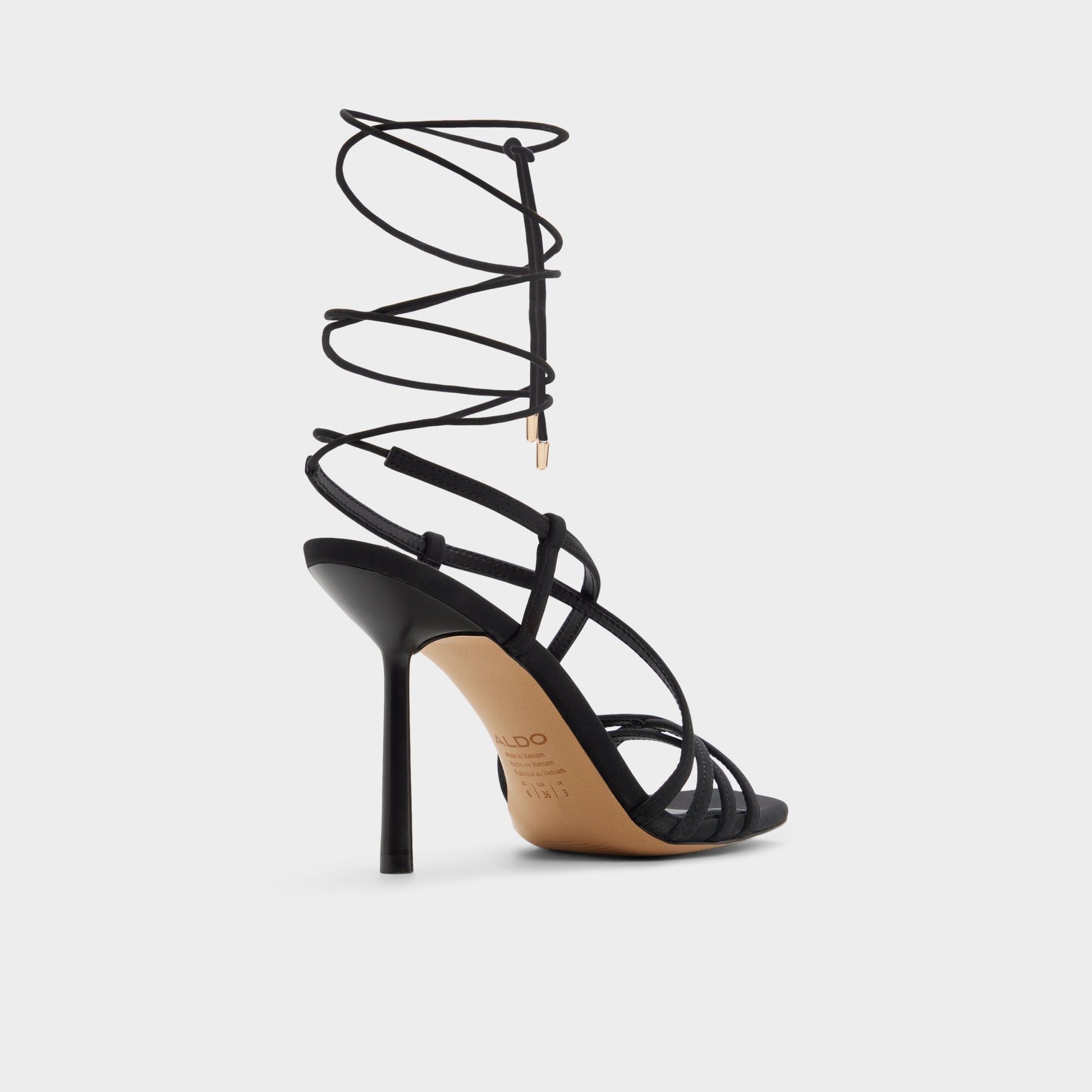 Three-quarter angle of Other black Talyia Strappy heeled sandal's back side