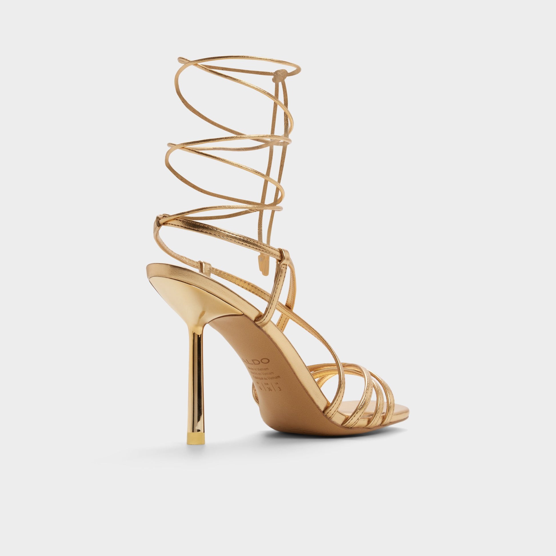 Three-quarter angle of Gold Talyia Strappy heeled sandal's back side