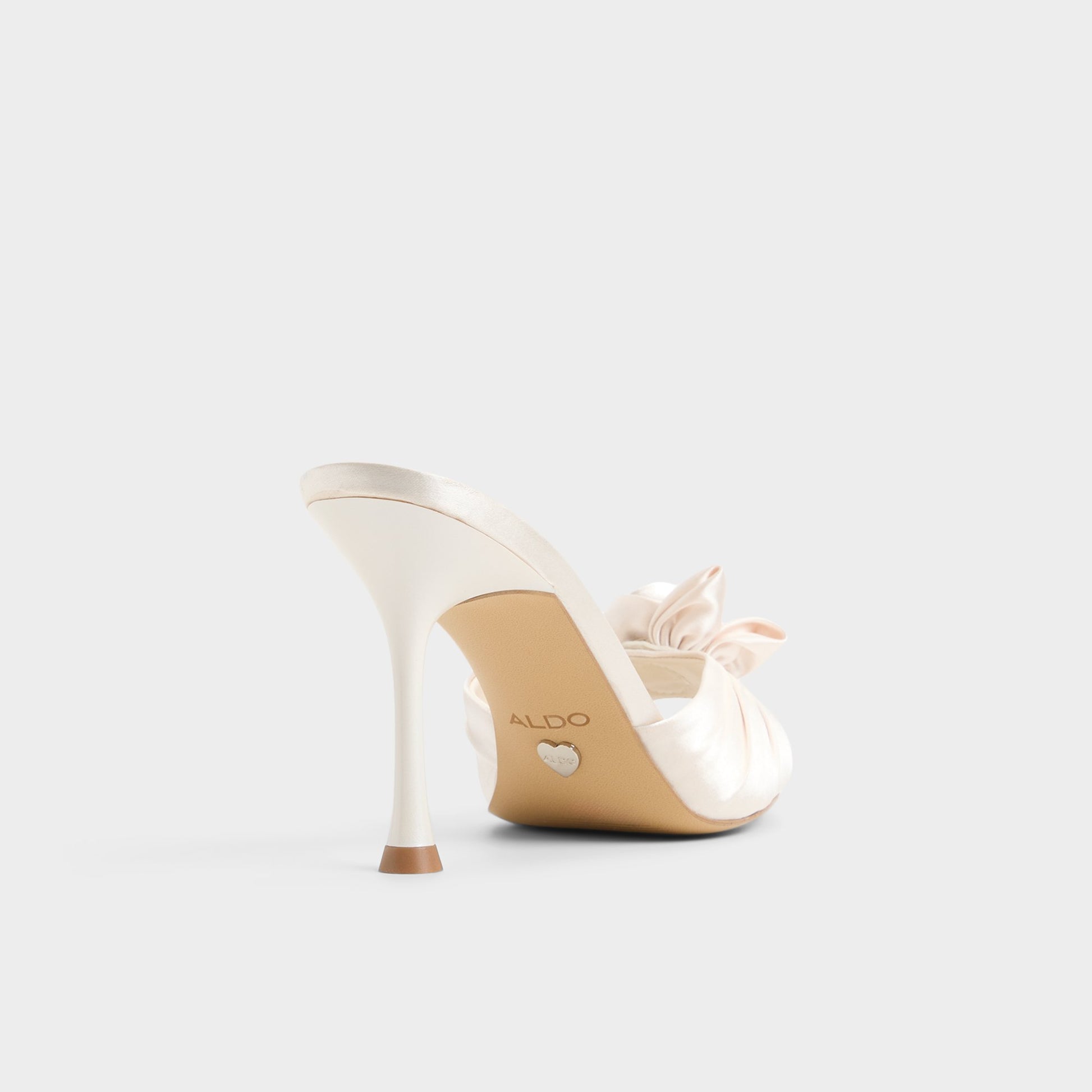 Three-quarter angle of Other white Rosalina Heeled mule's back side