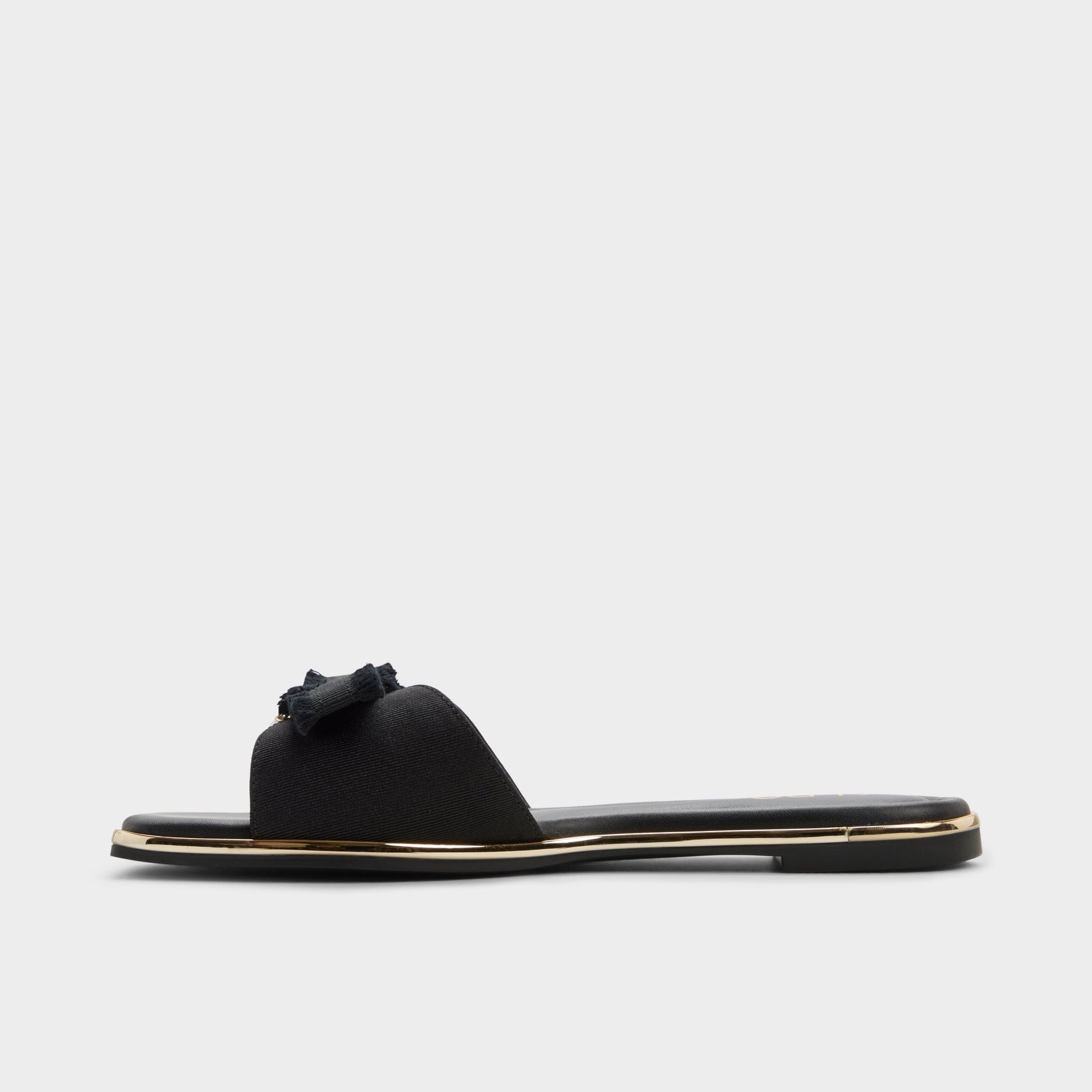 Side view of Black Rhuli Slide sandal